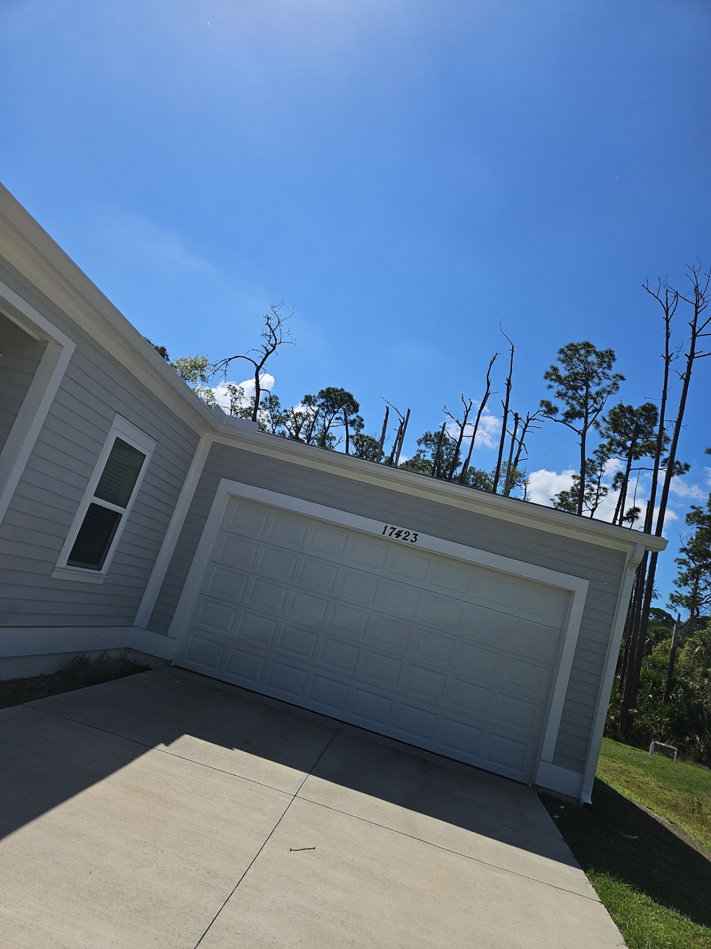 Downspout Installation using 3X4 Elbow Downspout in Port Charlotte FL by Gutter Professors