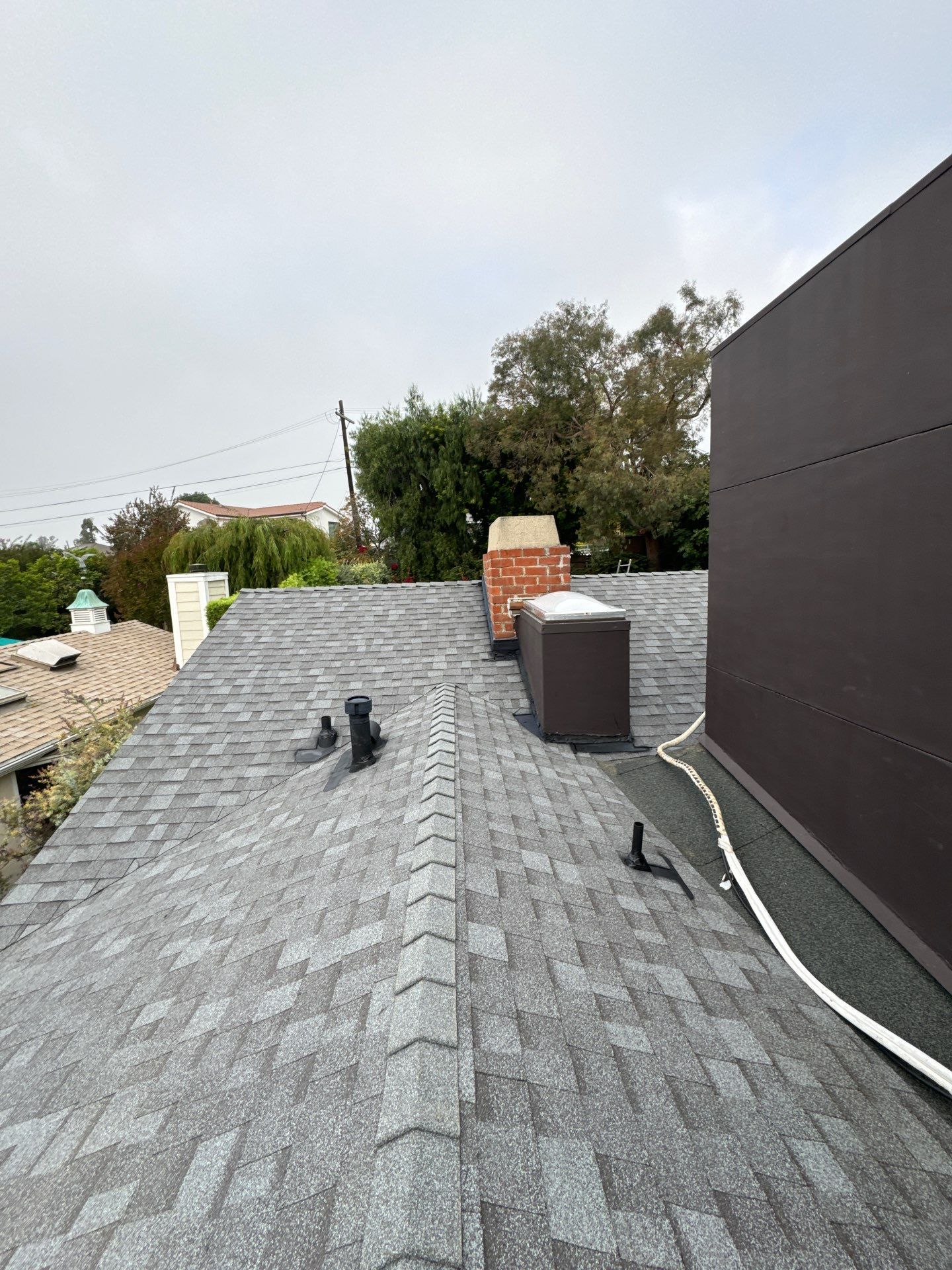 Residential Roofing Installation using Shingles and Silicone by Hull Brothers Roofing