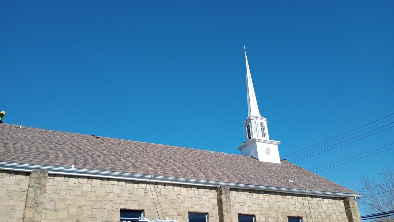 Commercial Roofing Installation using Performance Shingles by Mr. Roofer