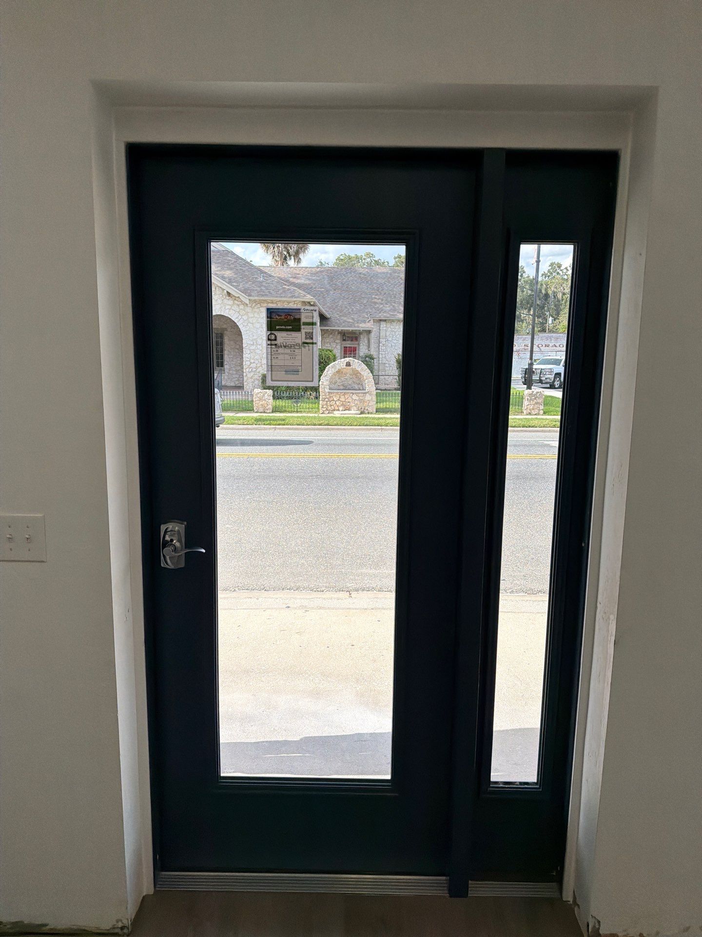 Commercial Entry Door Upgrade with ProVia Sidelight in Newberry by Windows & Doors Store