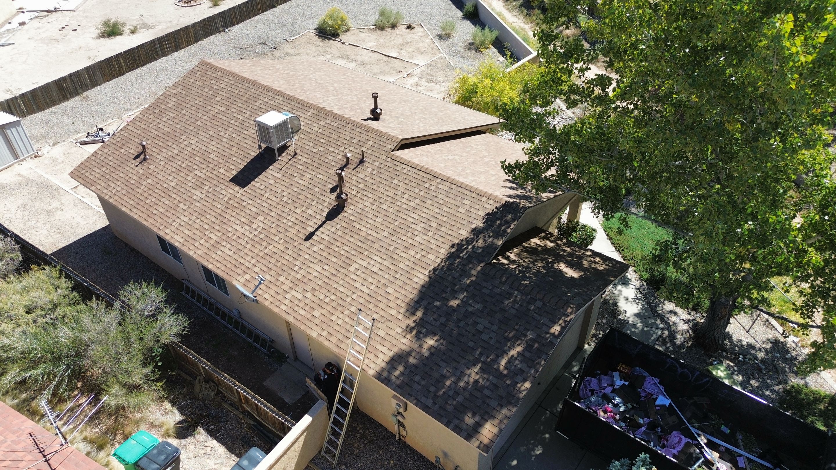 Oakridge Desert tan shingles in Chimayo Meadows by Doyle Roof Masters Inc