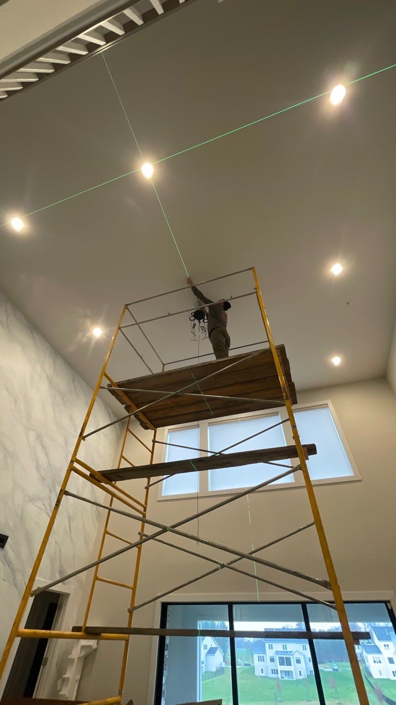 Chandelier Install  by HomeWerkes Design & Build