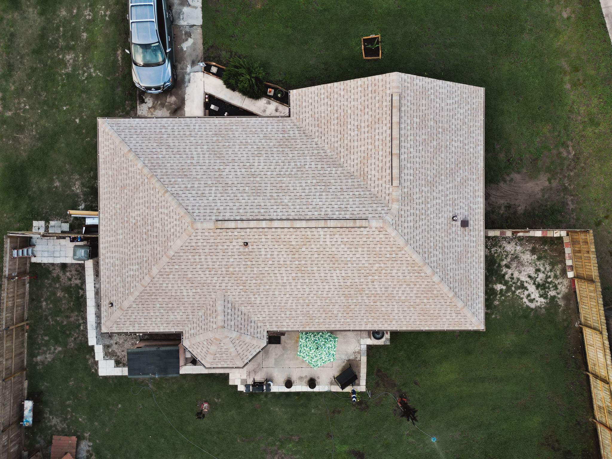 Residential Roofing Installation using Atlas Pinnacle Pristine Tan Mist by Talya Roofing