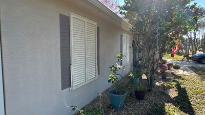 Hurricane Rated Bahama Shutters in Cream