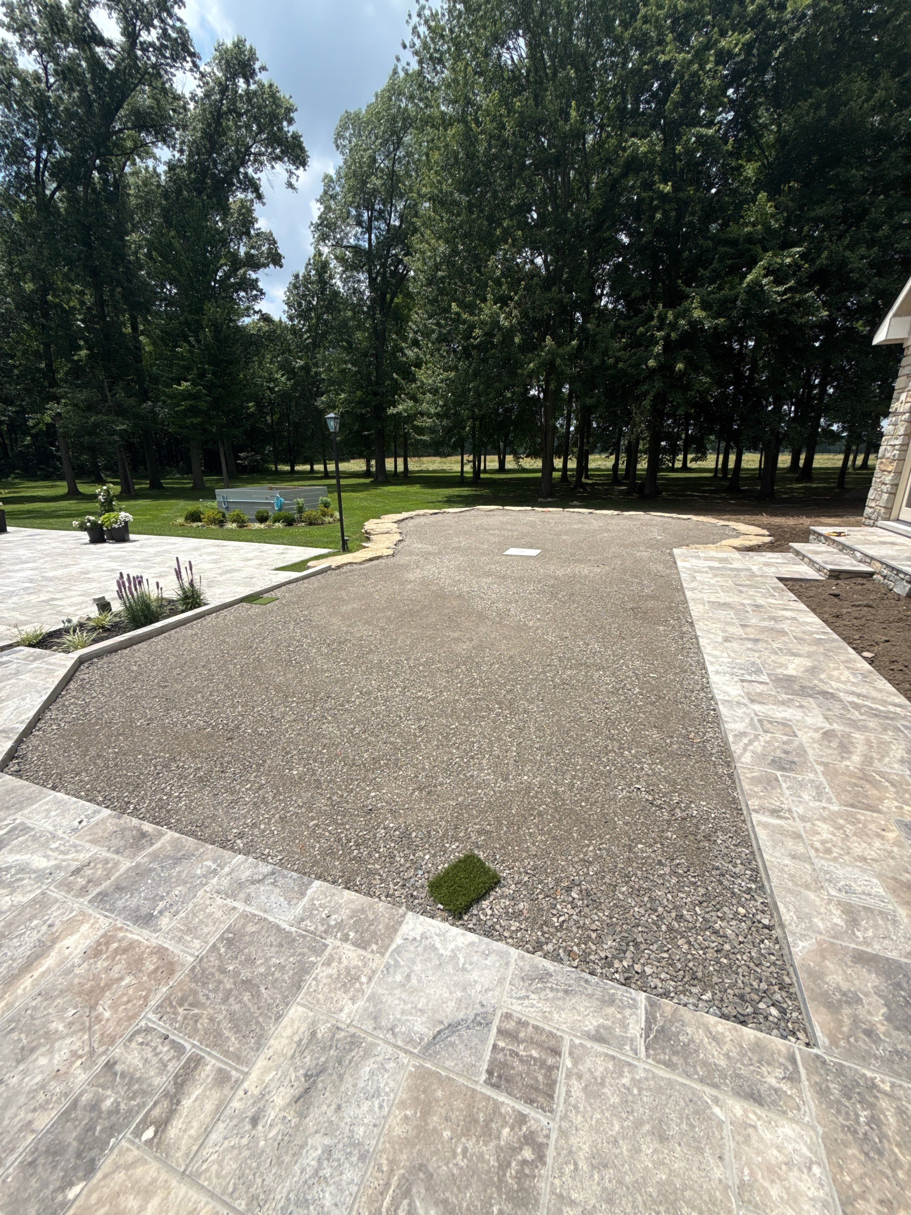 Custom Backyard Golf Green Accented by Flagstone Border in Morrow, OH by Southwest Greens Midwest