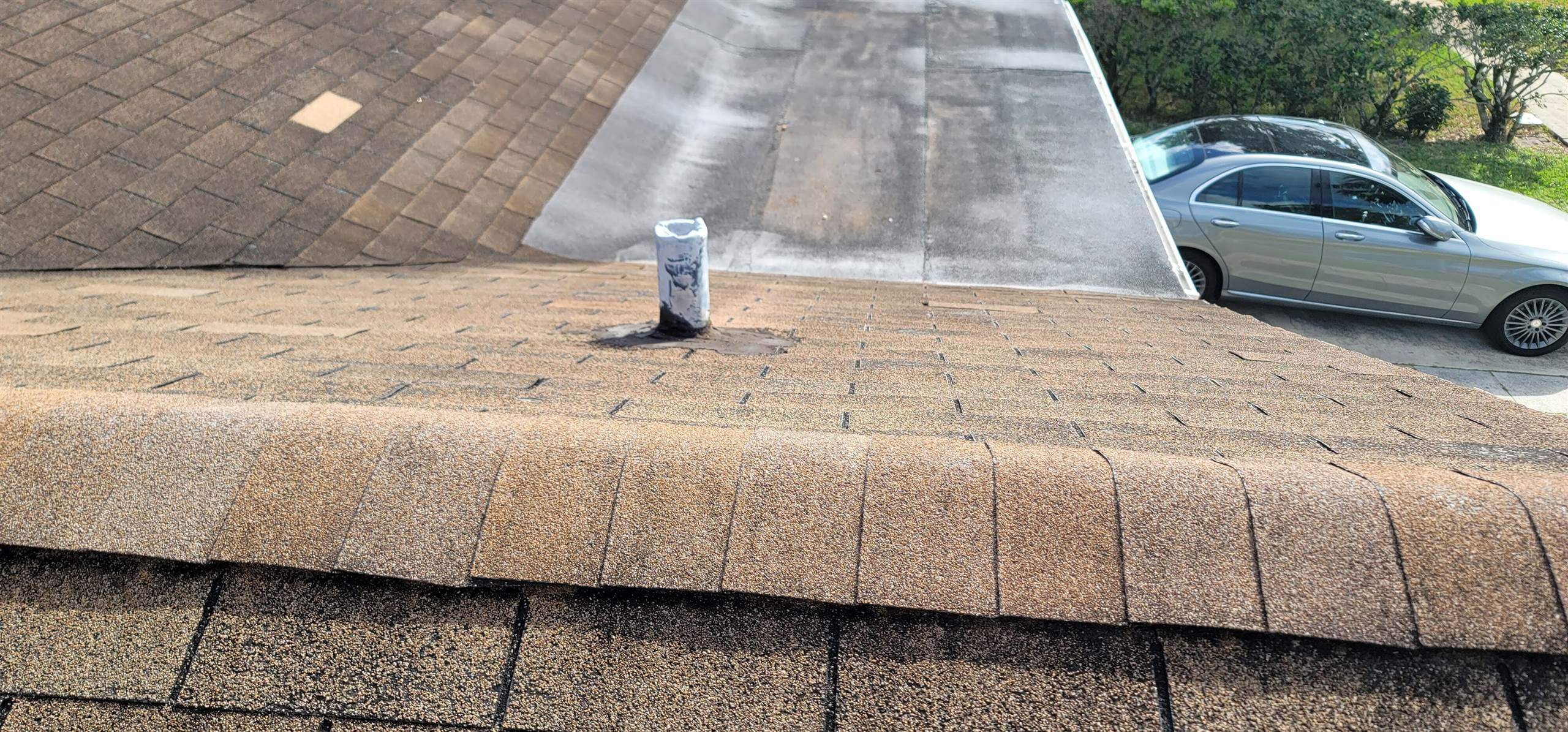 Standing Seam Metal & Flat Re-Roof using 1.5" Nail Strip 24ga Solar White Kynar Coated Standing Seam Metal Panels by Morton Roofing, Inc.