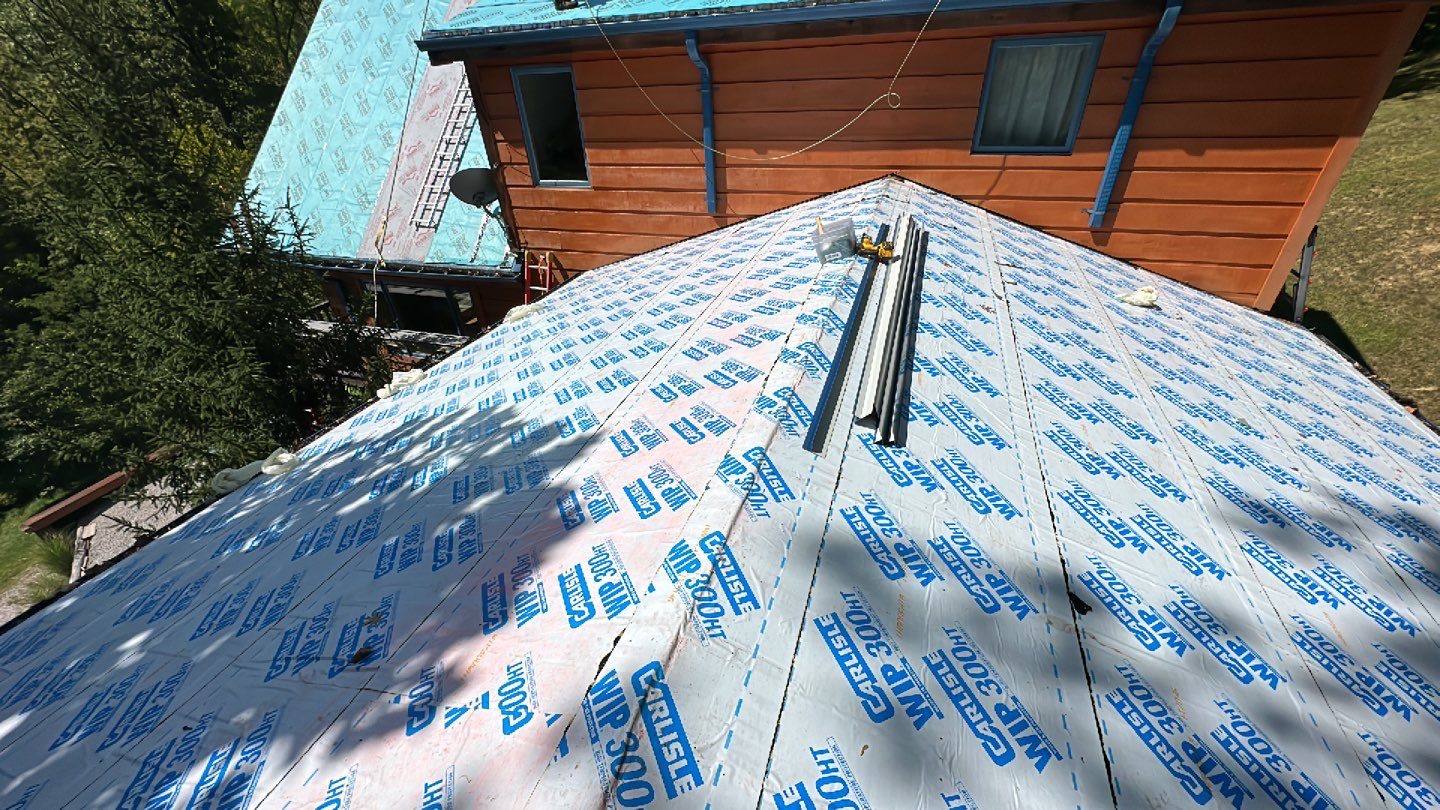 Residential Roofing Installation using Standing Seam Metal - Gallery Blue by RoofX 