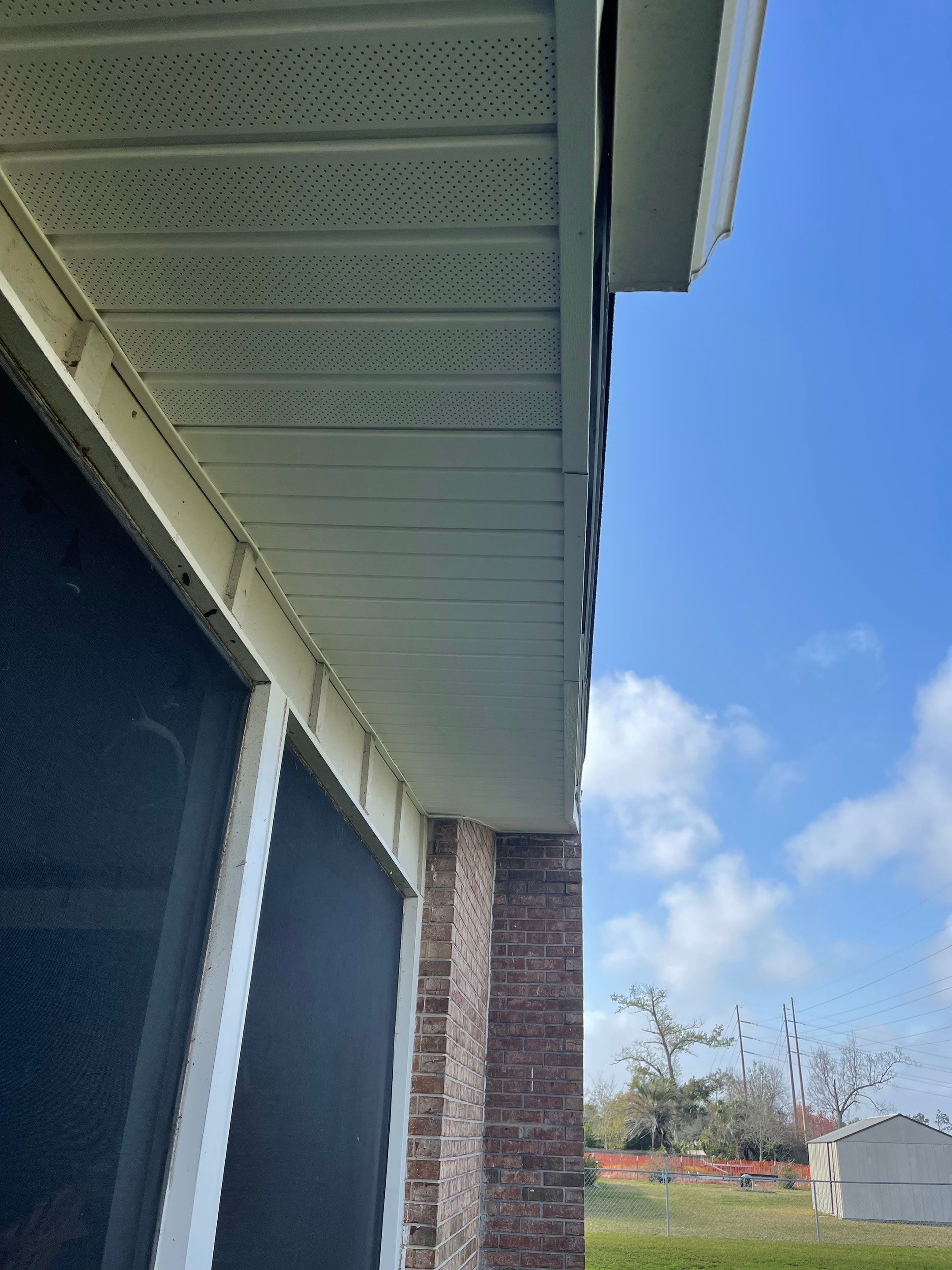 Soffit and Fascia Installation Using White Vinyl Soffit by Gutter Professors