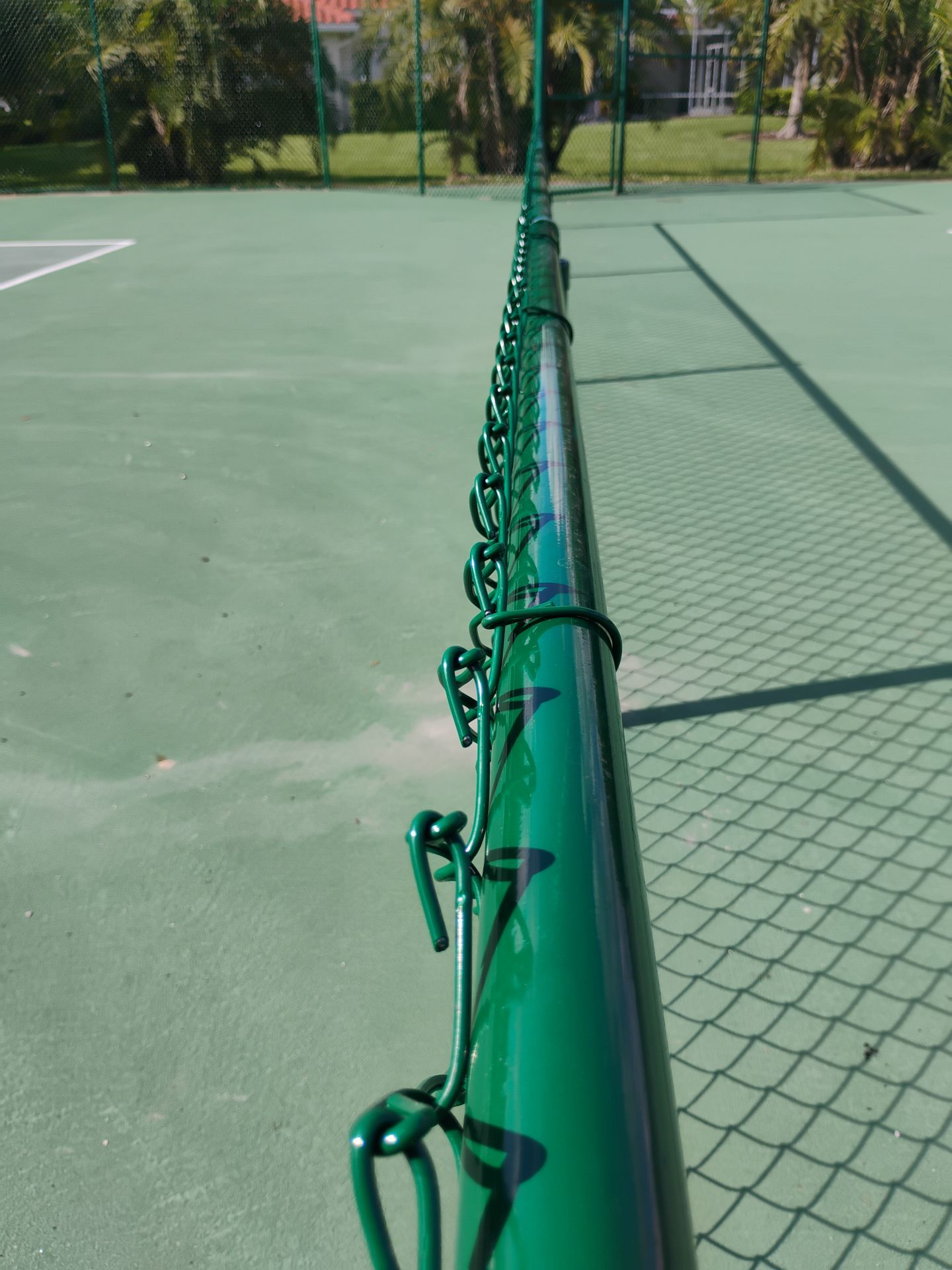 Commercial Tennis Court Chain Link Fence Repair in Sarasota by True Fence LLC