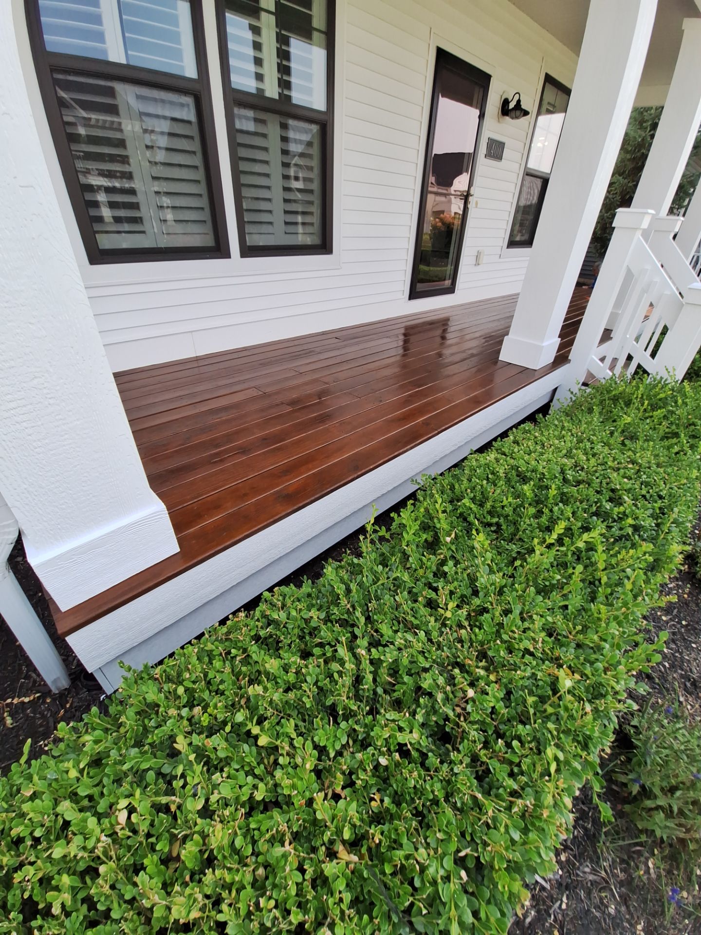 Freshly Stained Deck with Painted Railings by Gordon Painting
