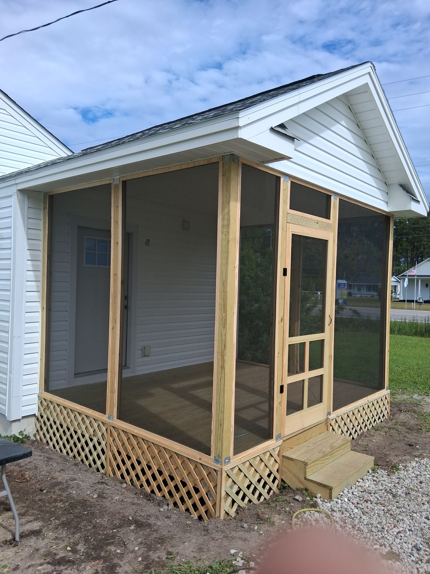 Custom Screened Porch and Deck Addition in Sea Level by The Remodeling Company
