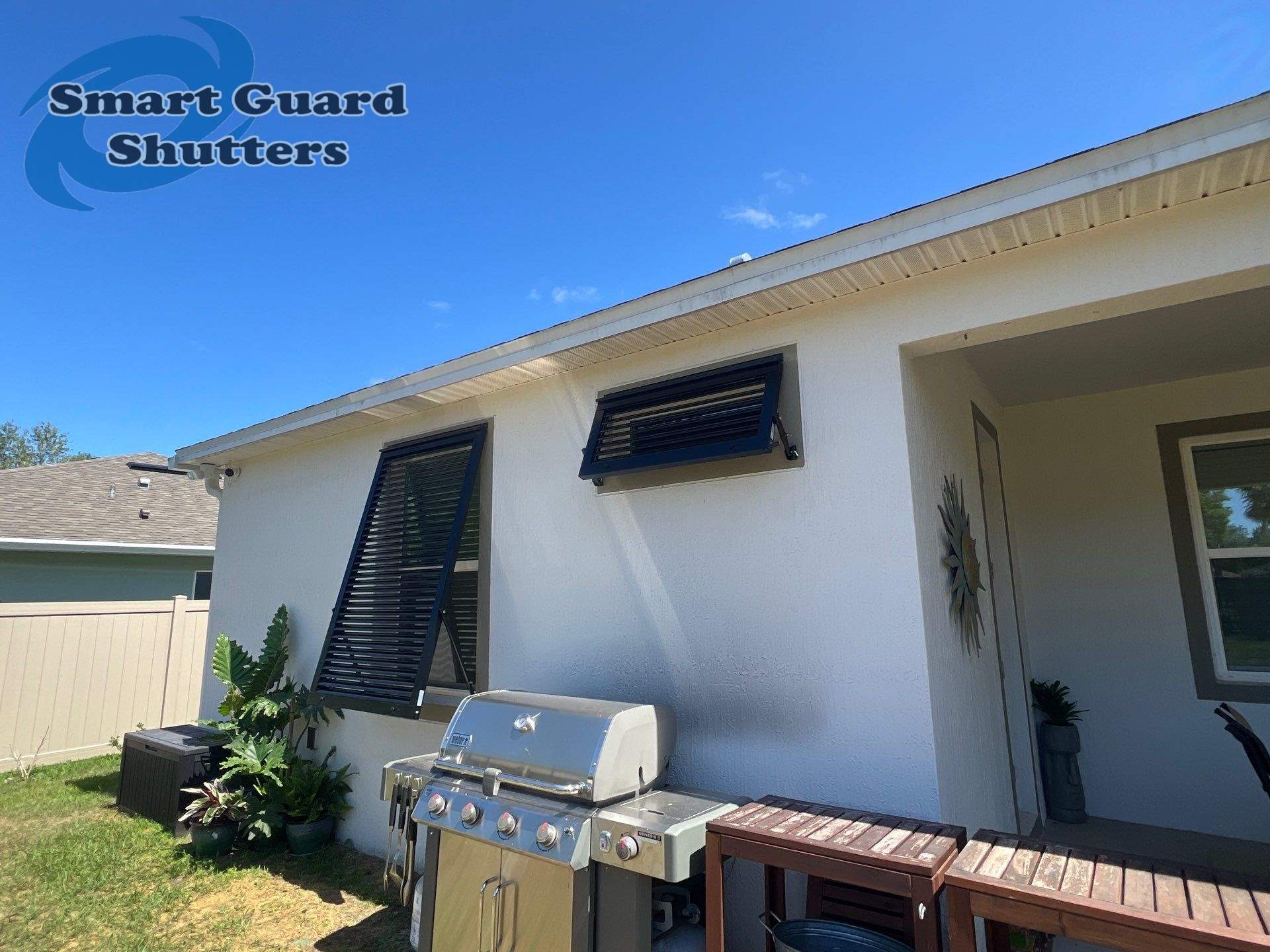 Impact Bahama Shutters in Jet Black MATTE by Smart Guard Shutters