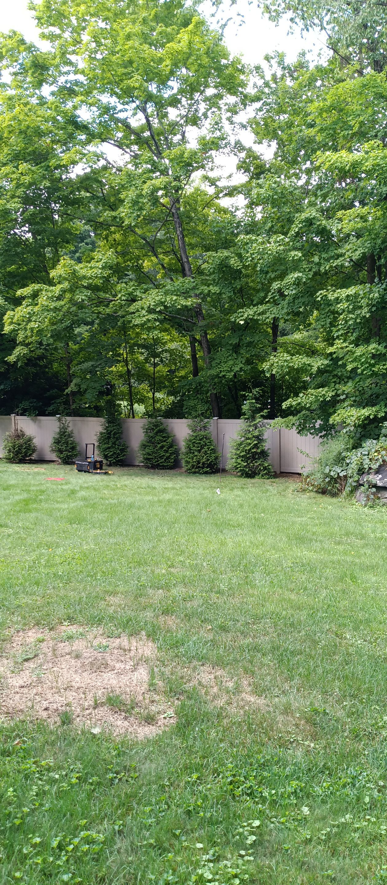 New Vinyl Privacy fence in Classic Clay by DiGiorgi Roofing and Siding Inc