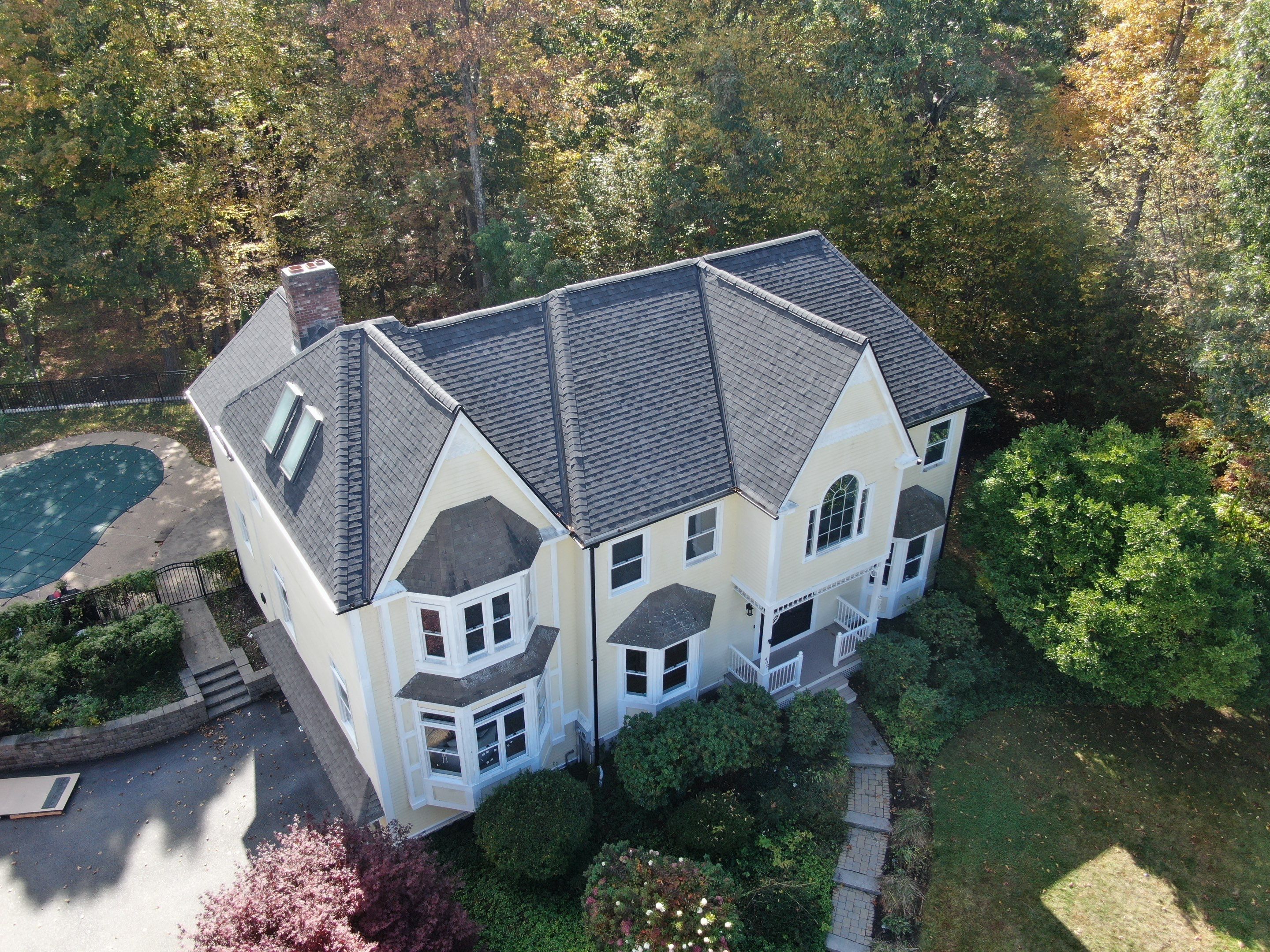 New Roof, Skylights, and Metal Accent Roof Installation in Groton by Mighty Dog Roofing of Greater Middlesex County