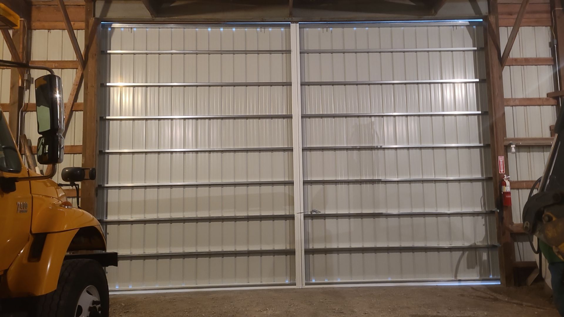 Replace worn-out pole barn doors by Dagny Builders