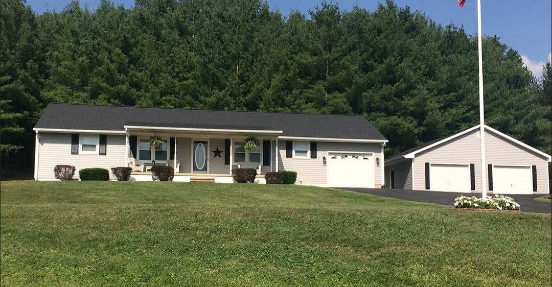 Roof & Siding Replacement by Assured Restoration