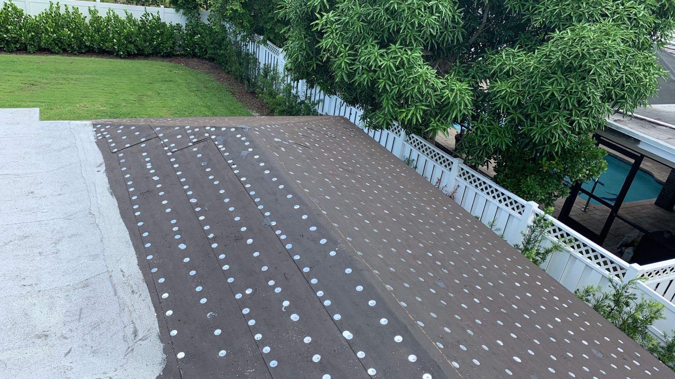 Residential Roofing Installation using 1" Nail strip metal roof by BLUES BROTHERS CONSTRUCTION CORP