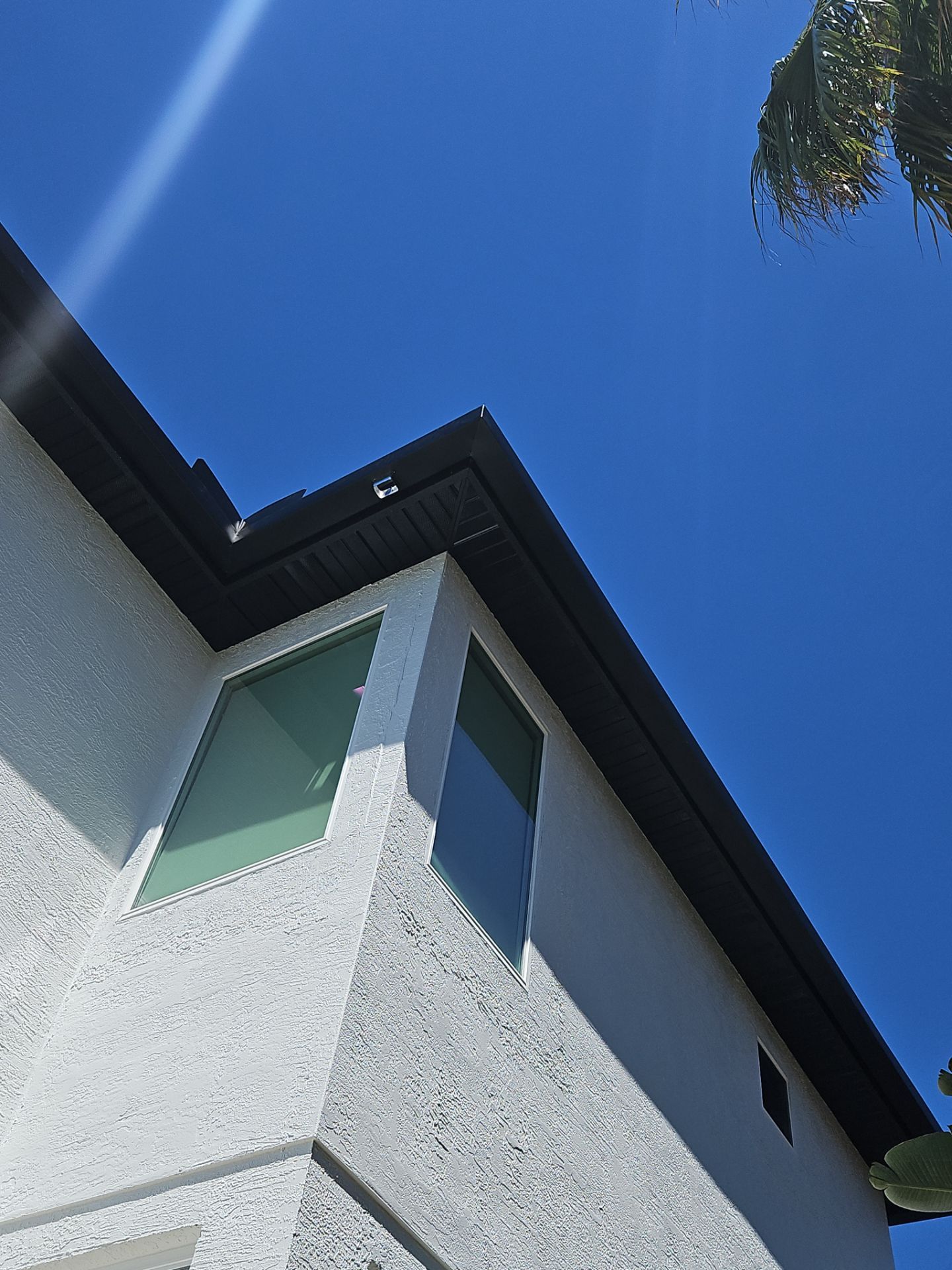 Soffit and Fascia Installation and black seamless gutters in Sarasota FL by Gutter Professors