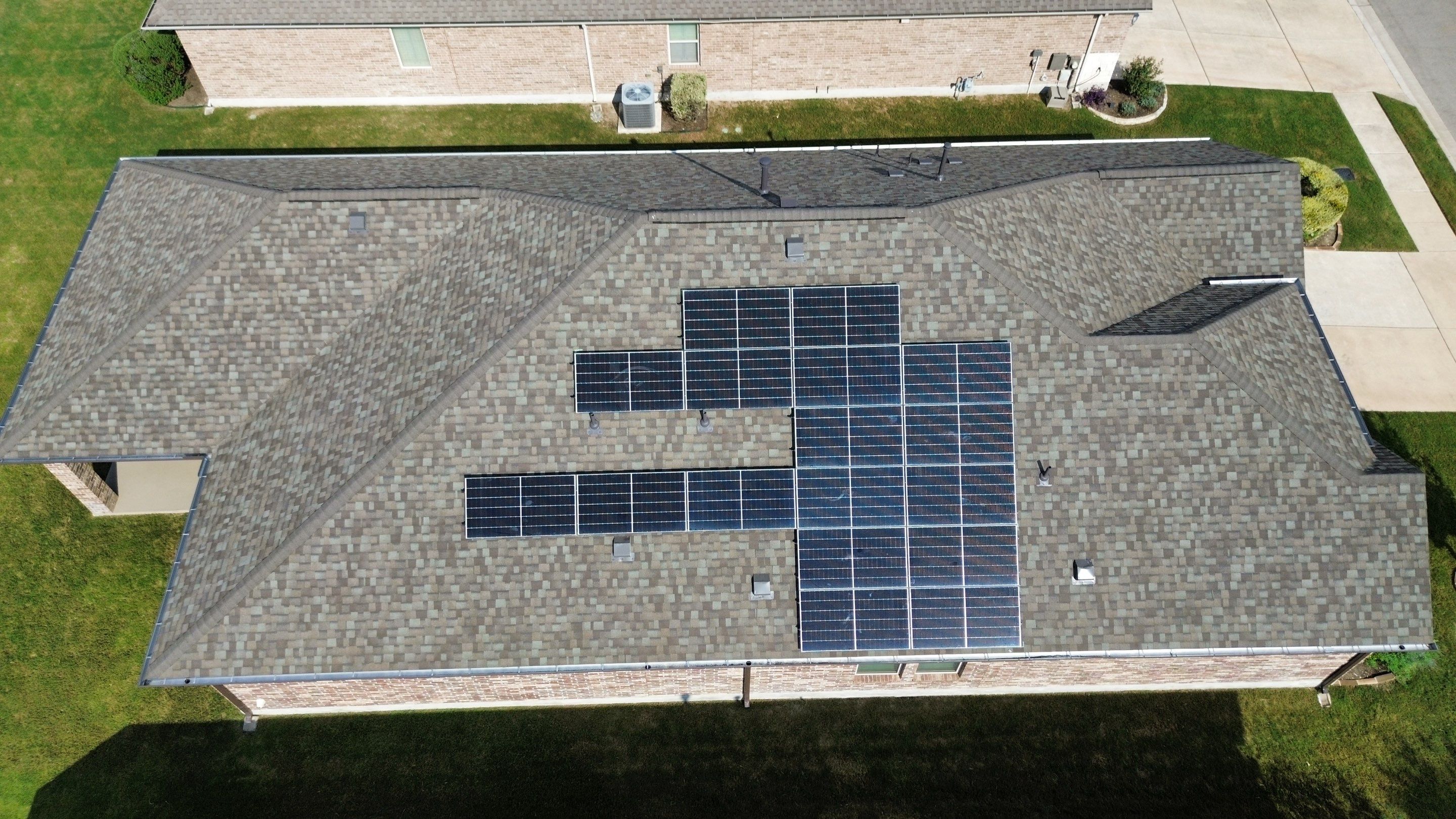Full Roof Replacement with Solar Reinstall – Duration Driftwood | Round Rock, TX by Kstylez Roofing & Construction