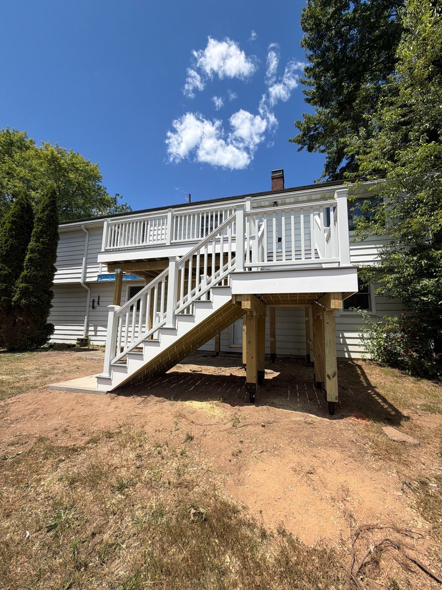 Deck Replacement using Trex tropical Island mist and transcend white railing.  by DiGiorgi Roofing and Siding Inc