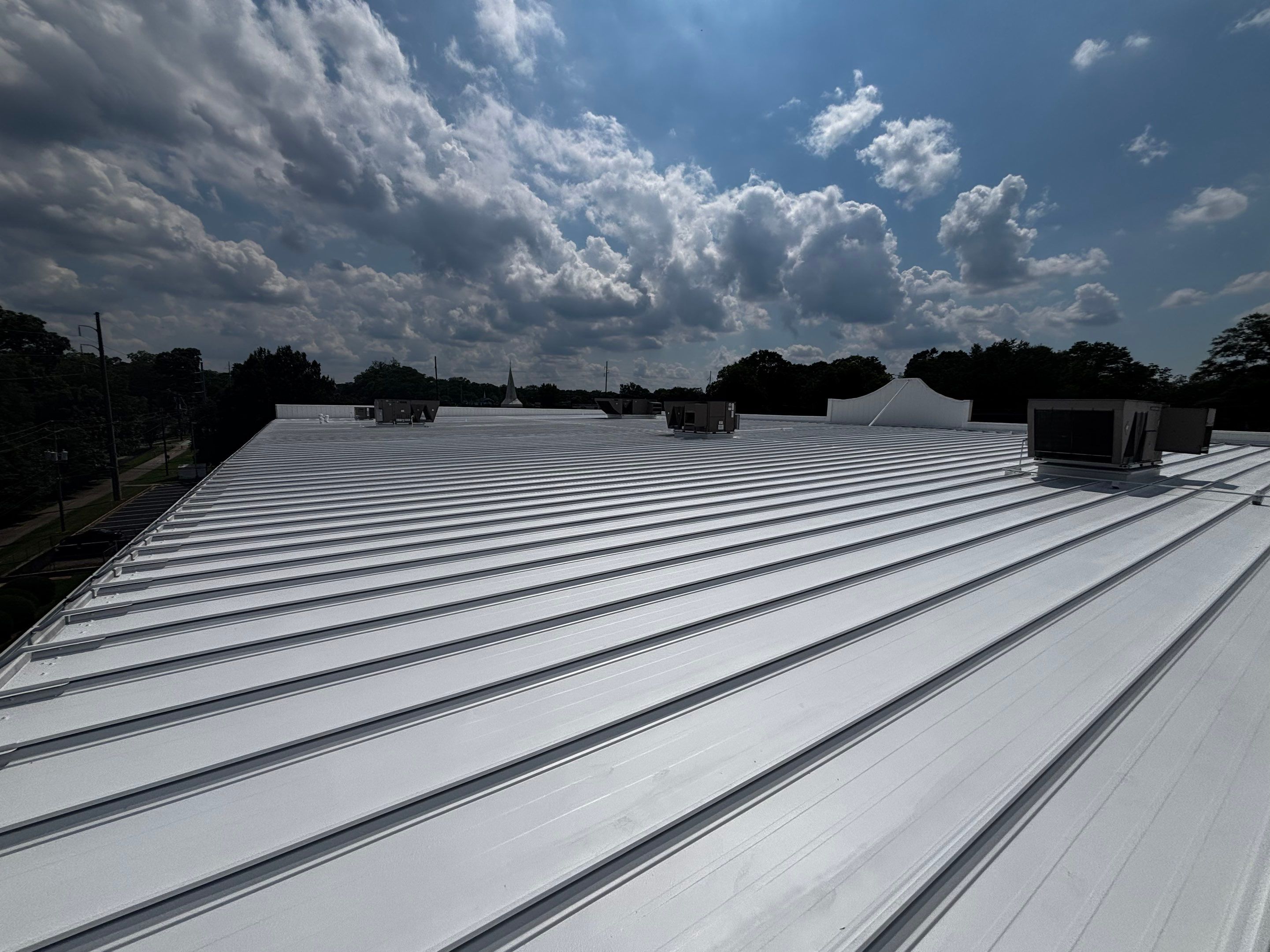 12,180 SQ Ft Commercial Metal Roof Restoration in Clarkston by Southern Roof Solutions
