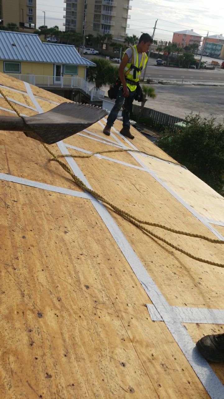 Commercial Roofing Installation using Metal roofing by American Roofing & Construction LLC