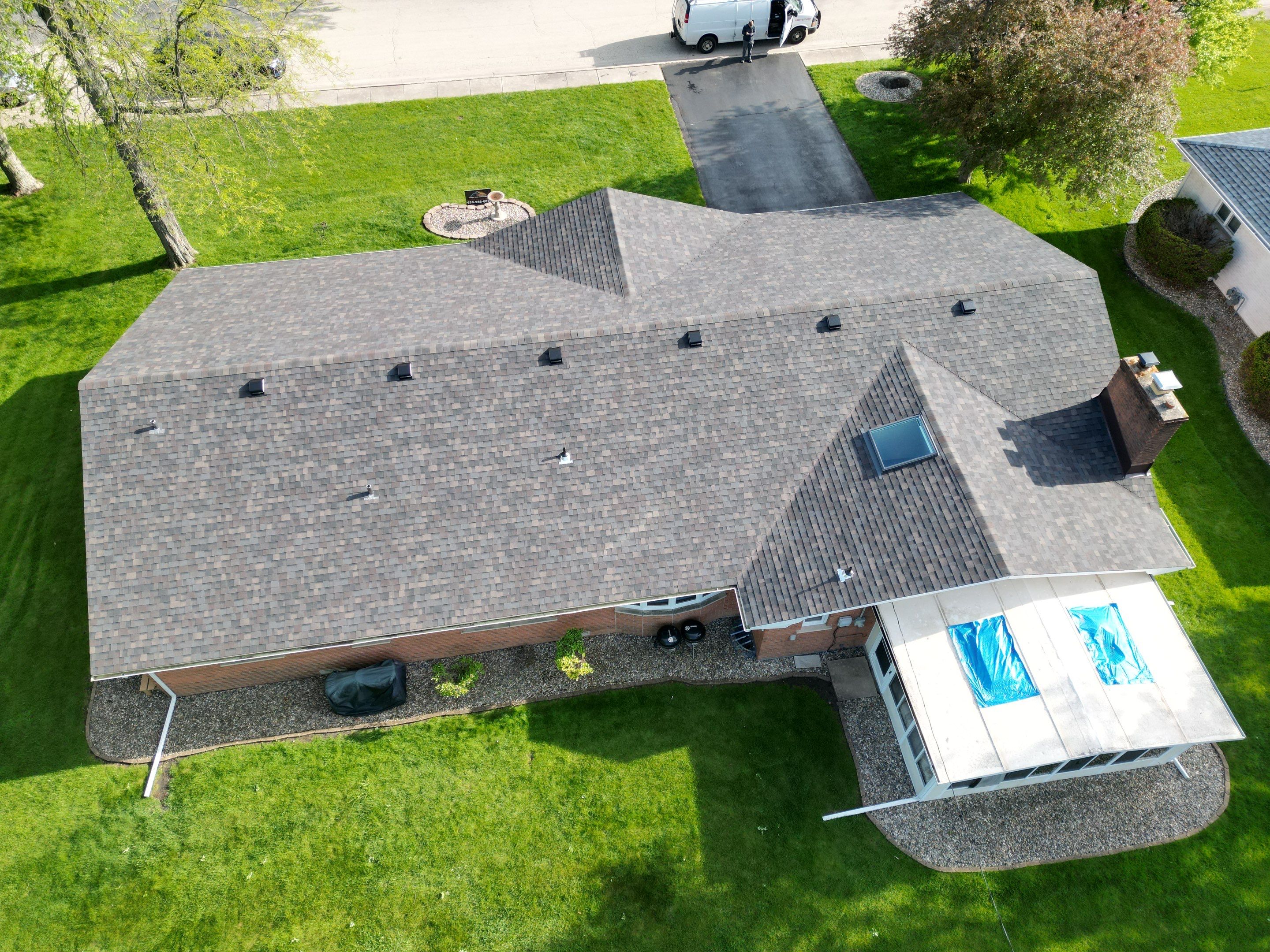 Roofing, siding and gutters by Optimal Home Improvement 