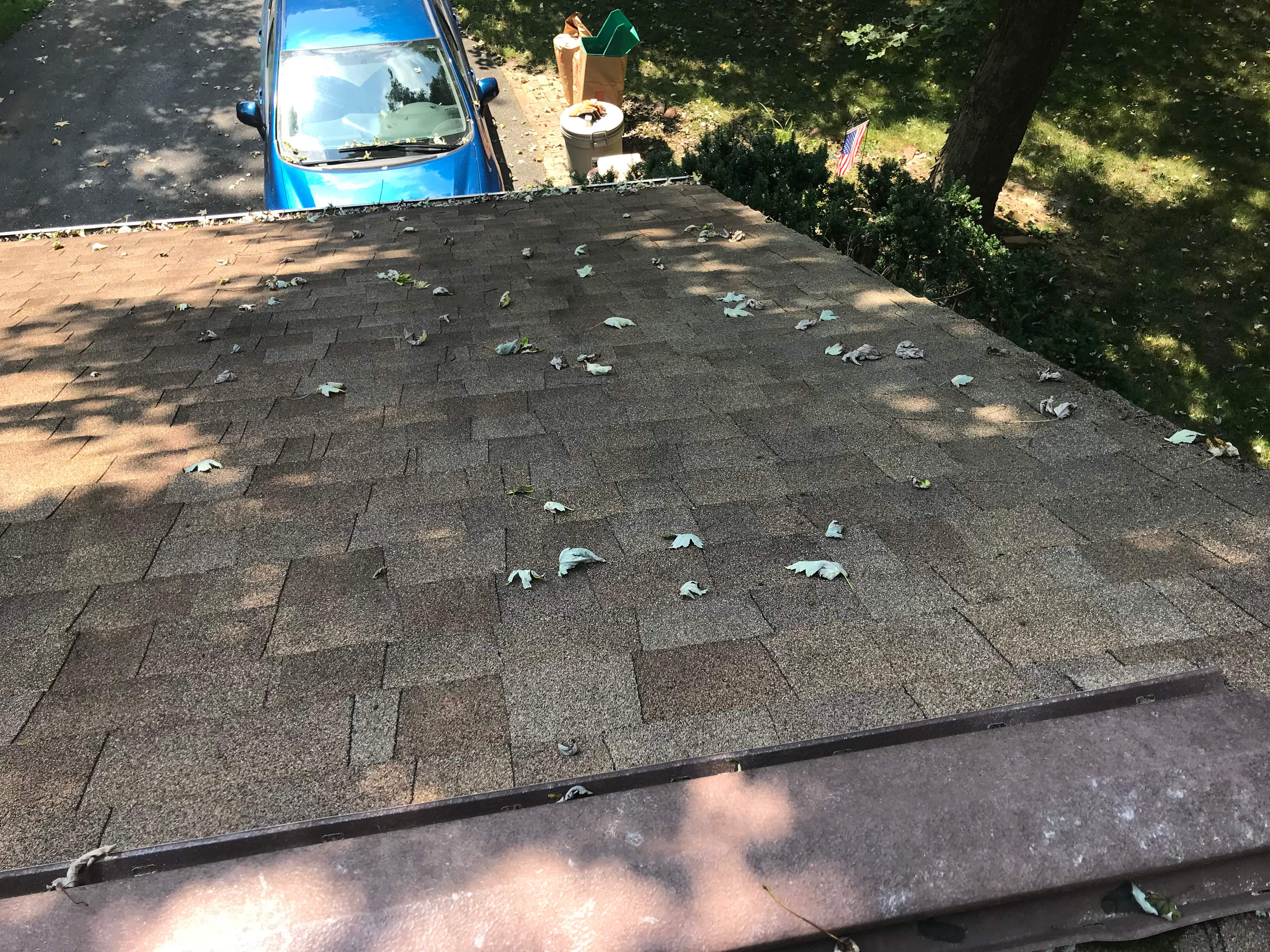 Residential Roofing Installation using Landmark Shingles Color Weatherwood by Alpha Design Services