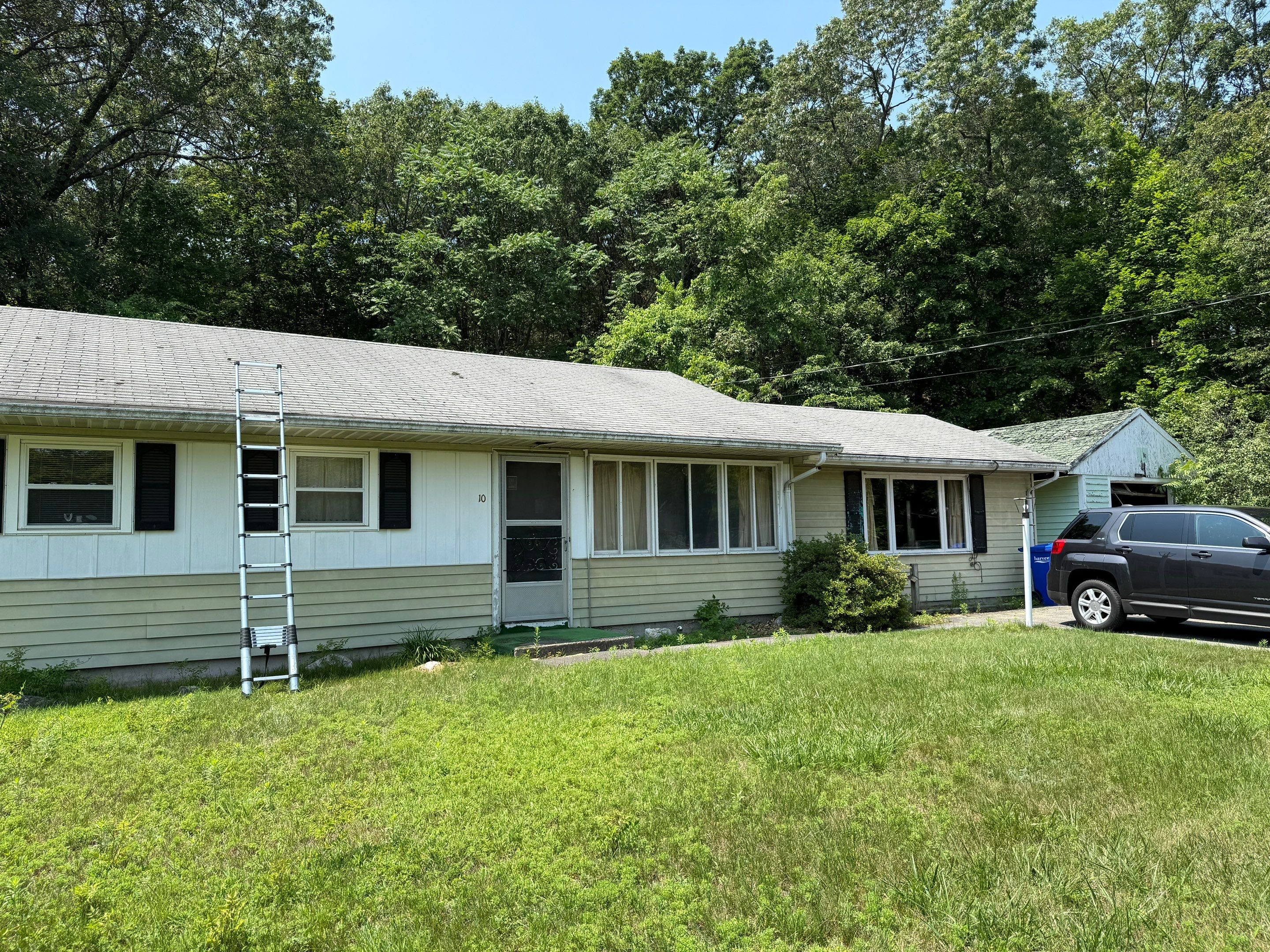 Onyx Black Roof Transformation in Maynard, MA by Mighty Dog Roofing of Greater Middlesex County