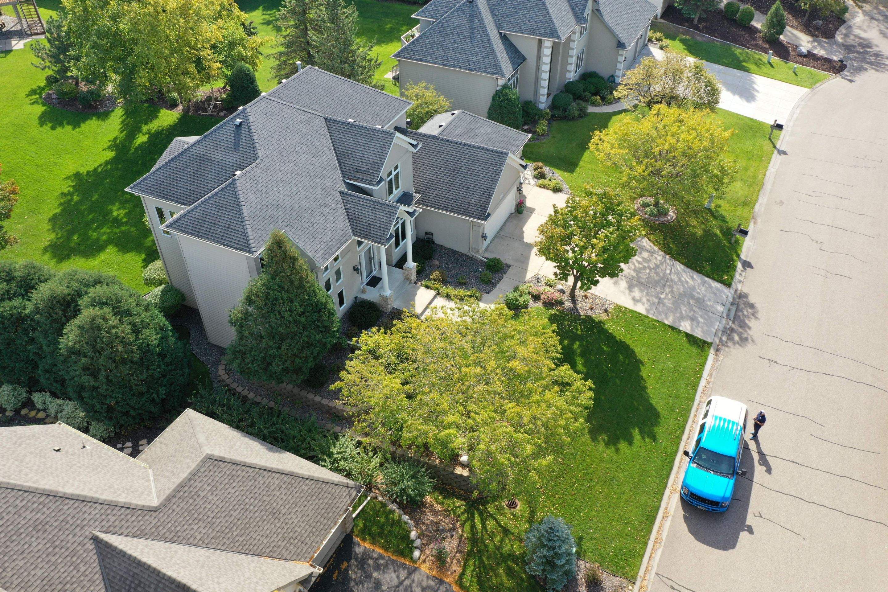 Residential Roofing Installation using Certainteed Landmark Moire Black by MODERN EXTERIOR SYSTEMS