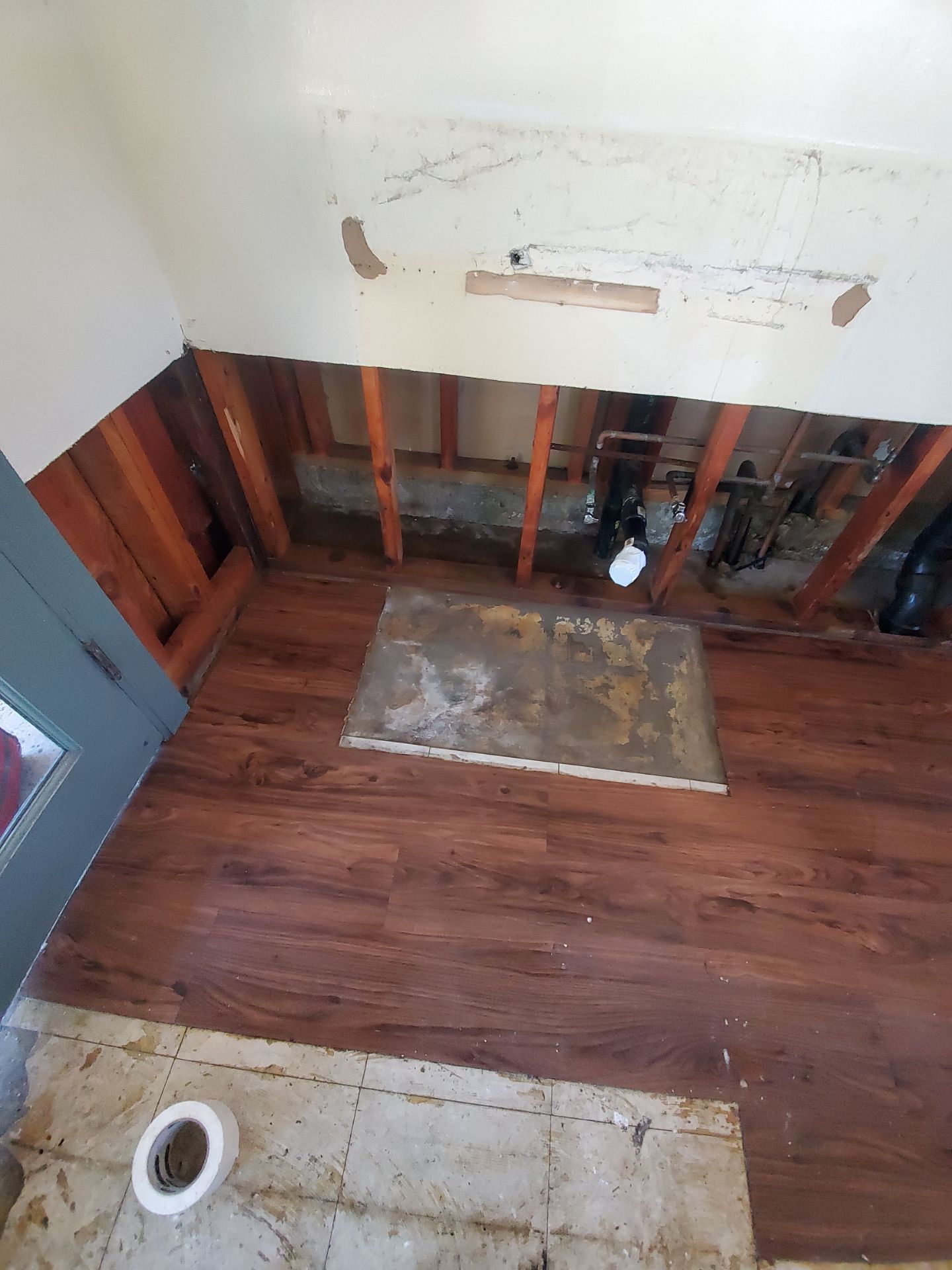 Laundry Room Water Restoration & Rebuild in Irvine by One Stop Source