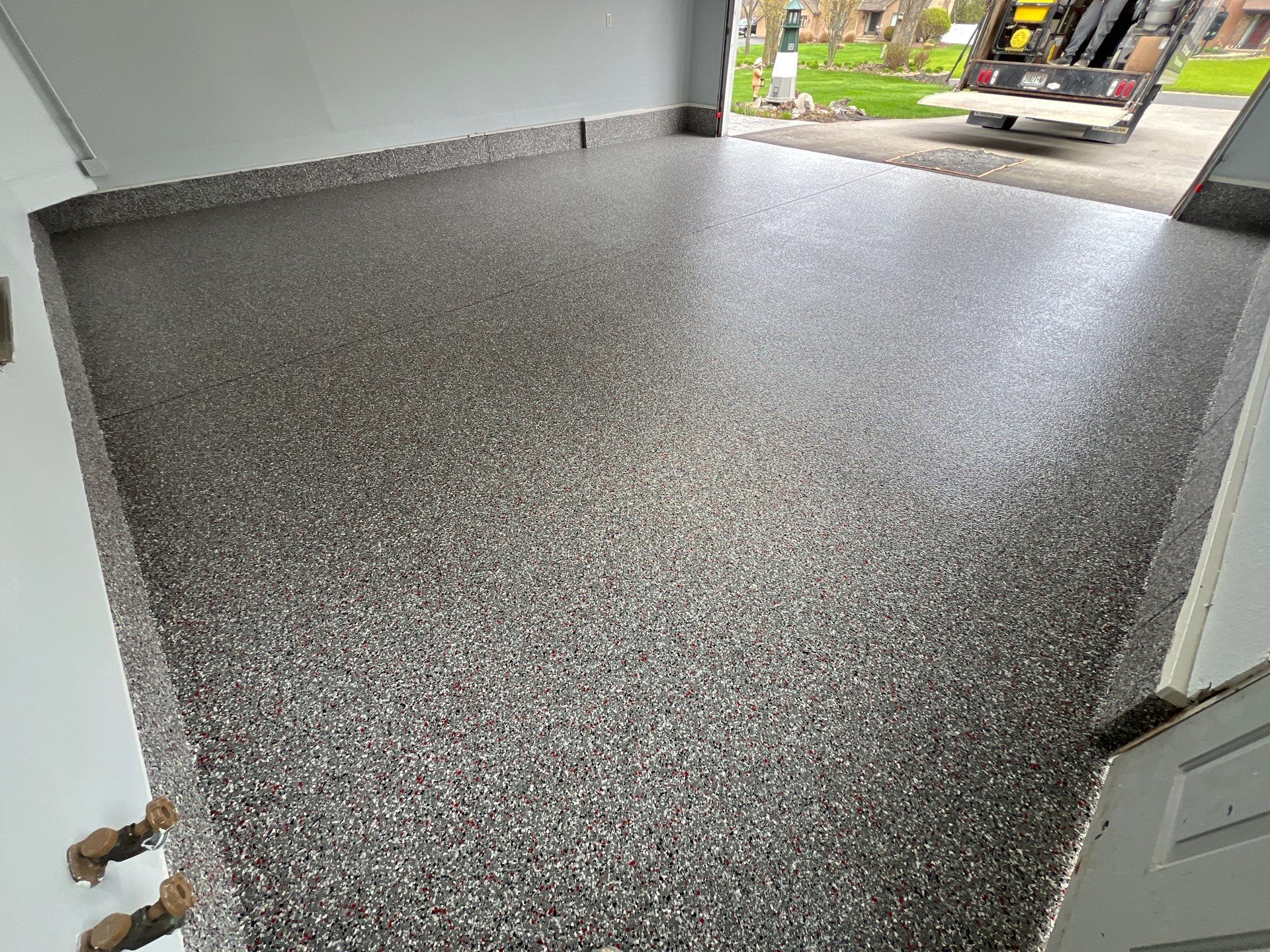 Crimson Storm Garage Coating  by NG Masonry & Construction LLC