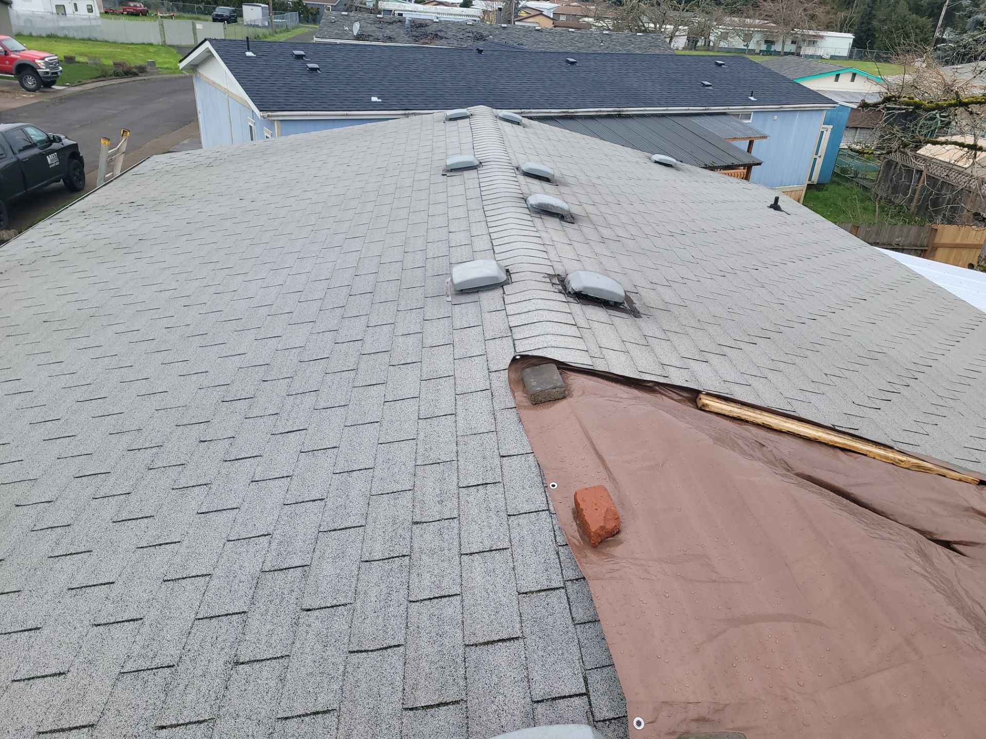 Residential Reroof using Owens Corning Duration Shingles in the color Chateau Green. by BEST Roofing & Waterproofing