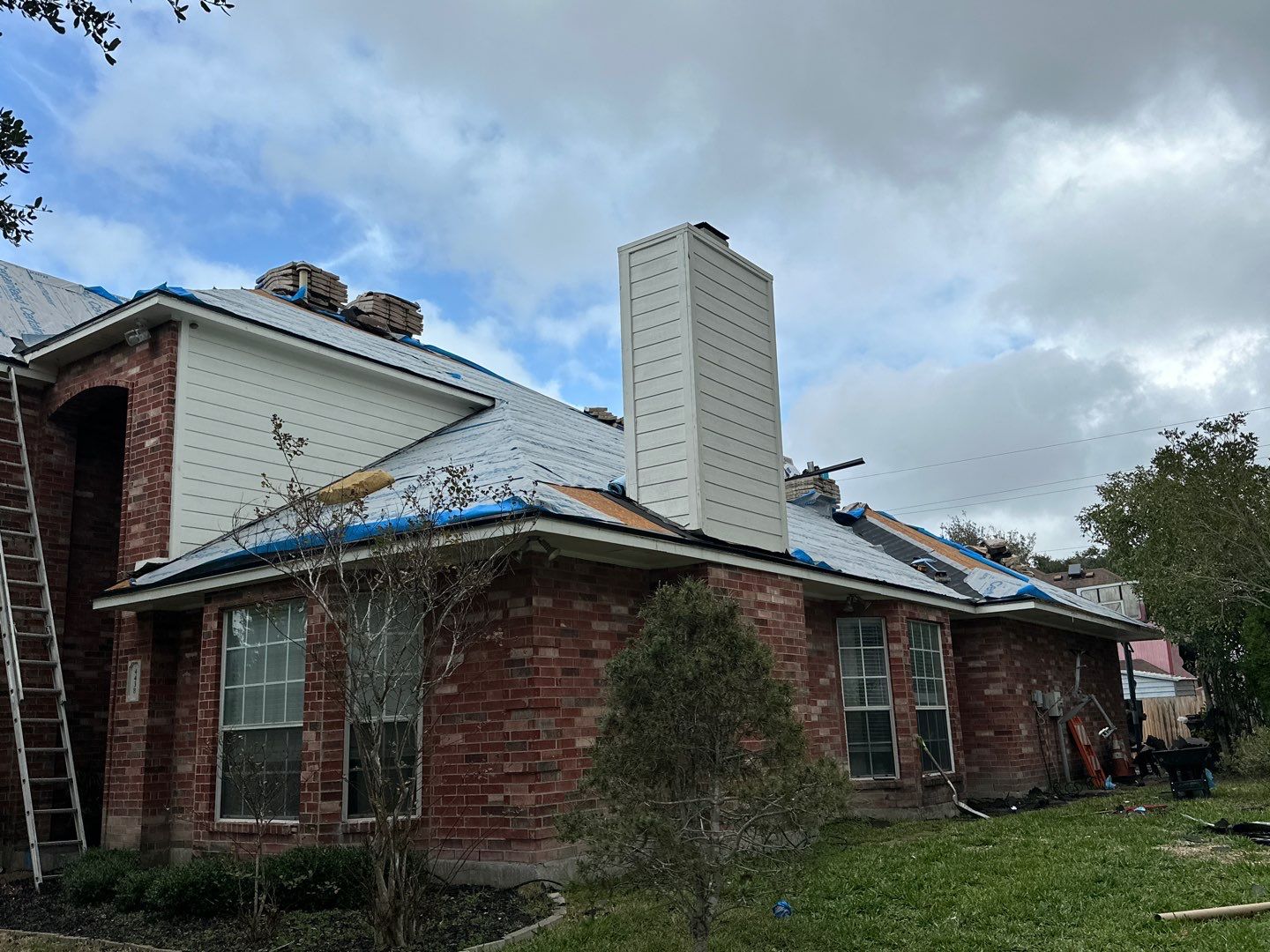 Residential Roofing Installation using Certainteed Landmark Moire Black by Galvan Roofing and Construction