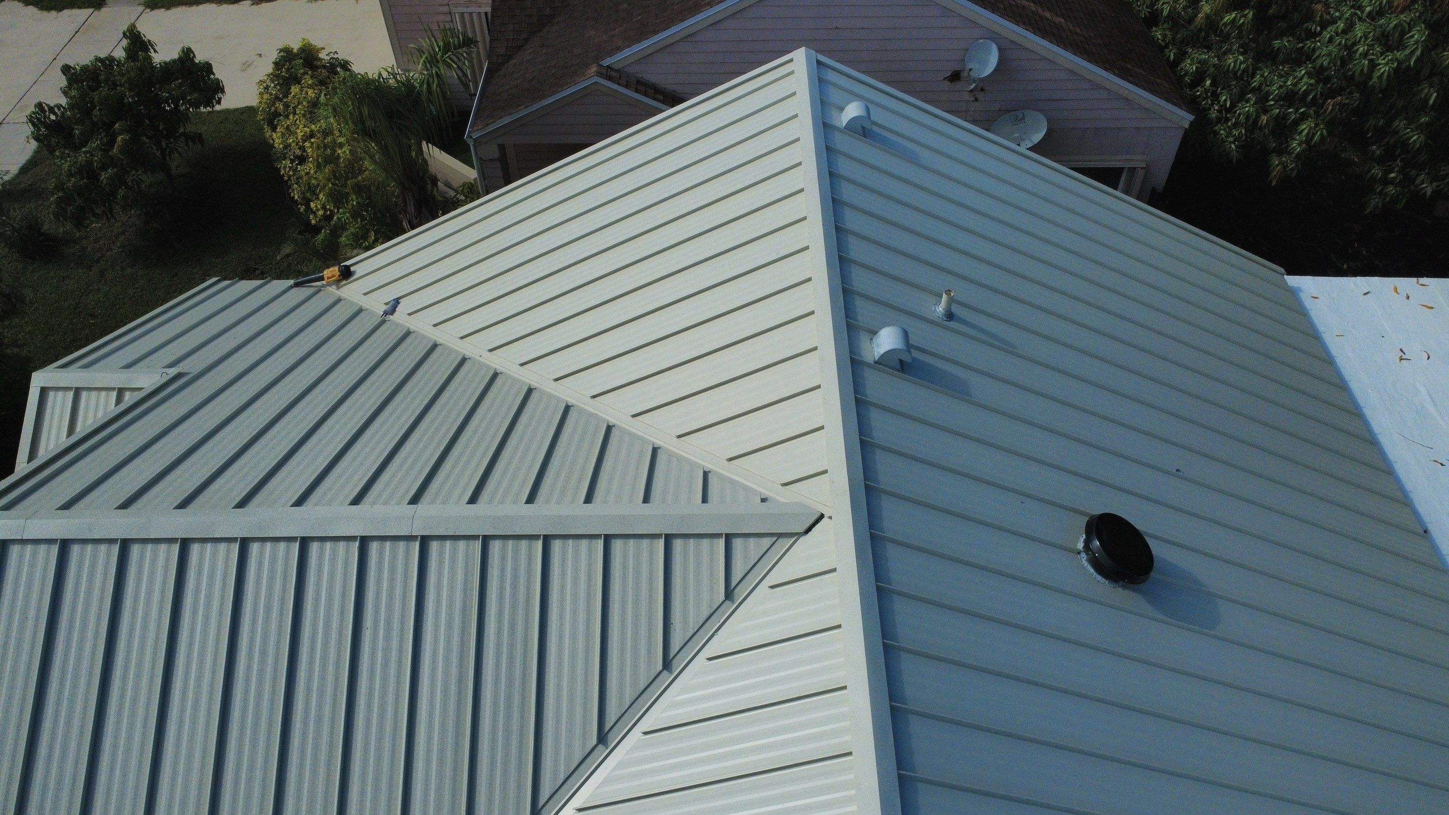 Residential Roofing Installation using 1.5'' Mechanical Seam by BLUES BROTHERS ROOFING