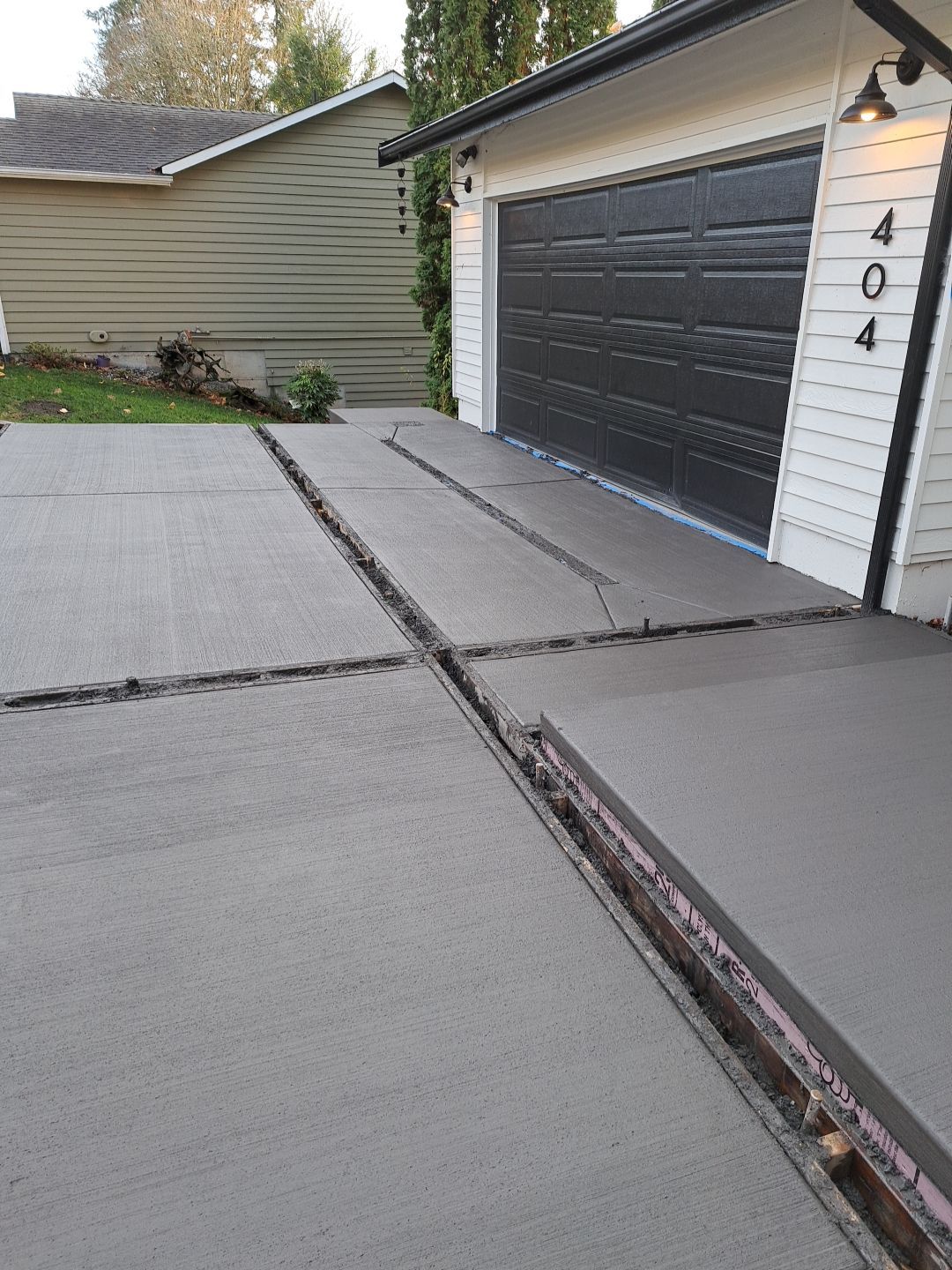 Raphil Haswega Concrete Driveway  by Jireh Asphalt & Concrete Inc 
