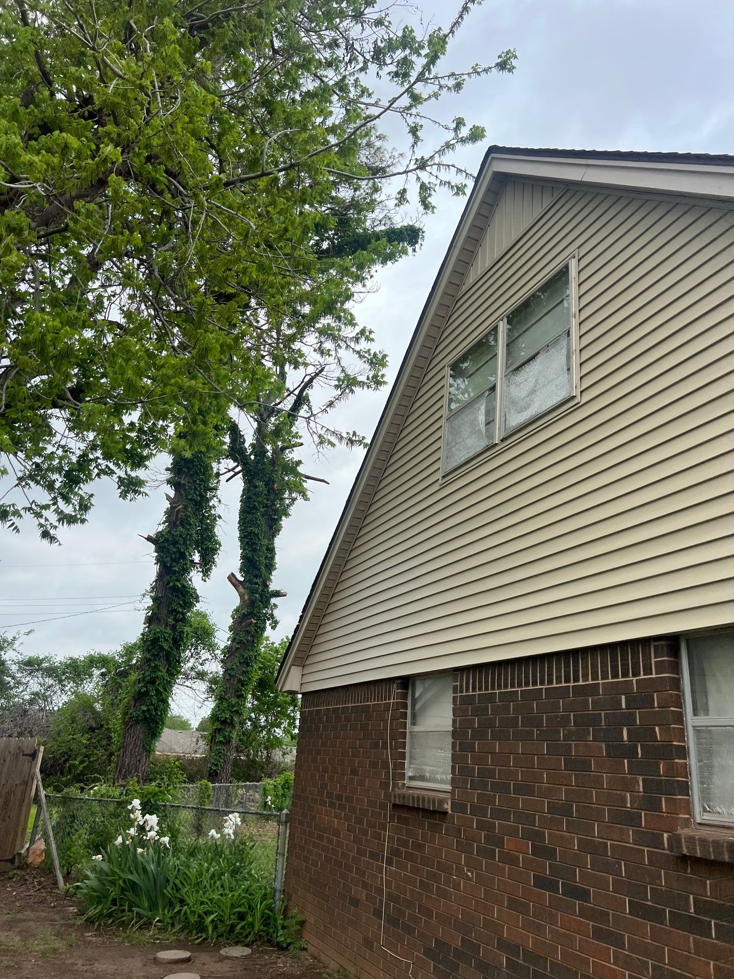 siding repair in Del City by McCann's Roofing and Construction