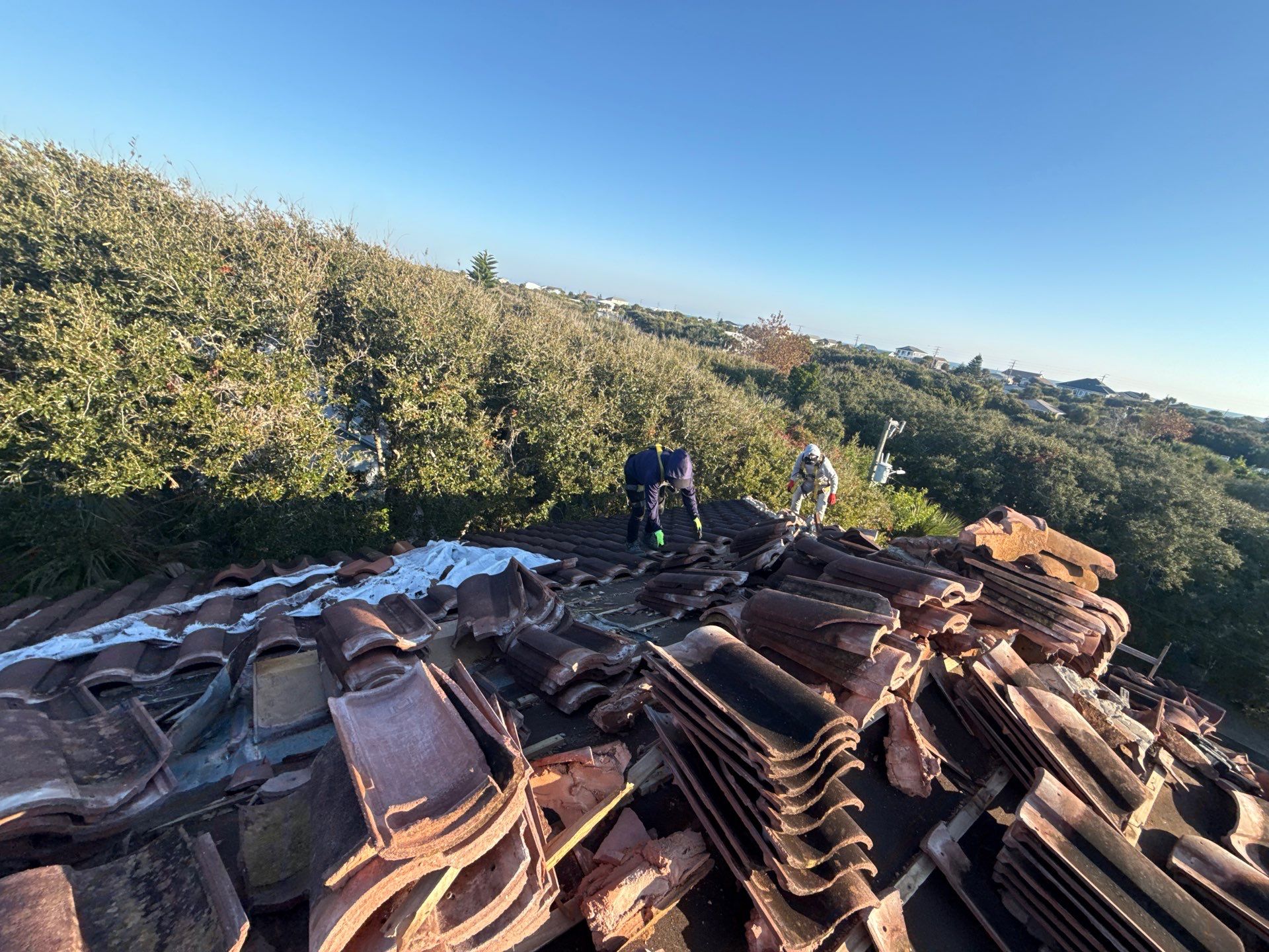 Flagler Beach Residential Tile Roof Replacement with Dark Barrel Tiles by Fortified Roofing Solutions Corp.