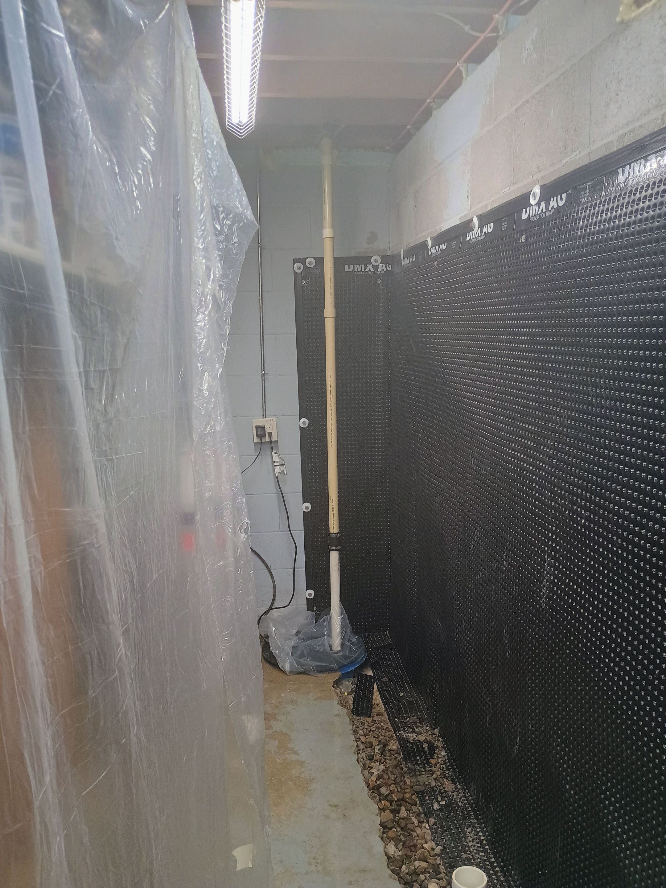 Depressurizing Denny's Basement Wall by Waterproofing Northeast