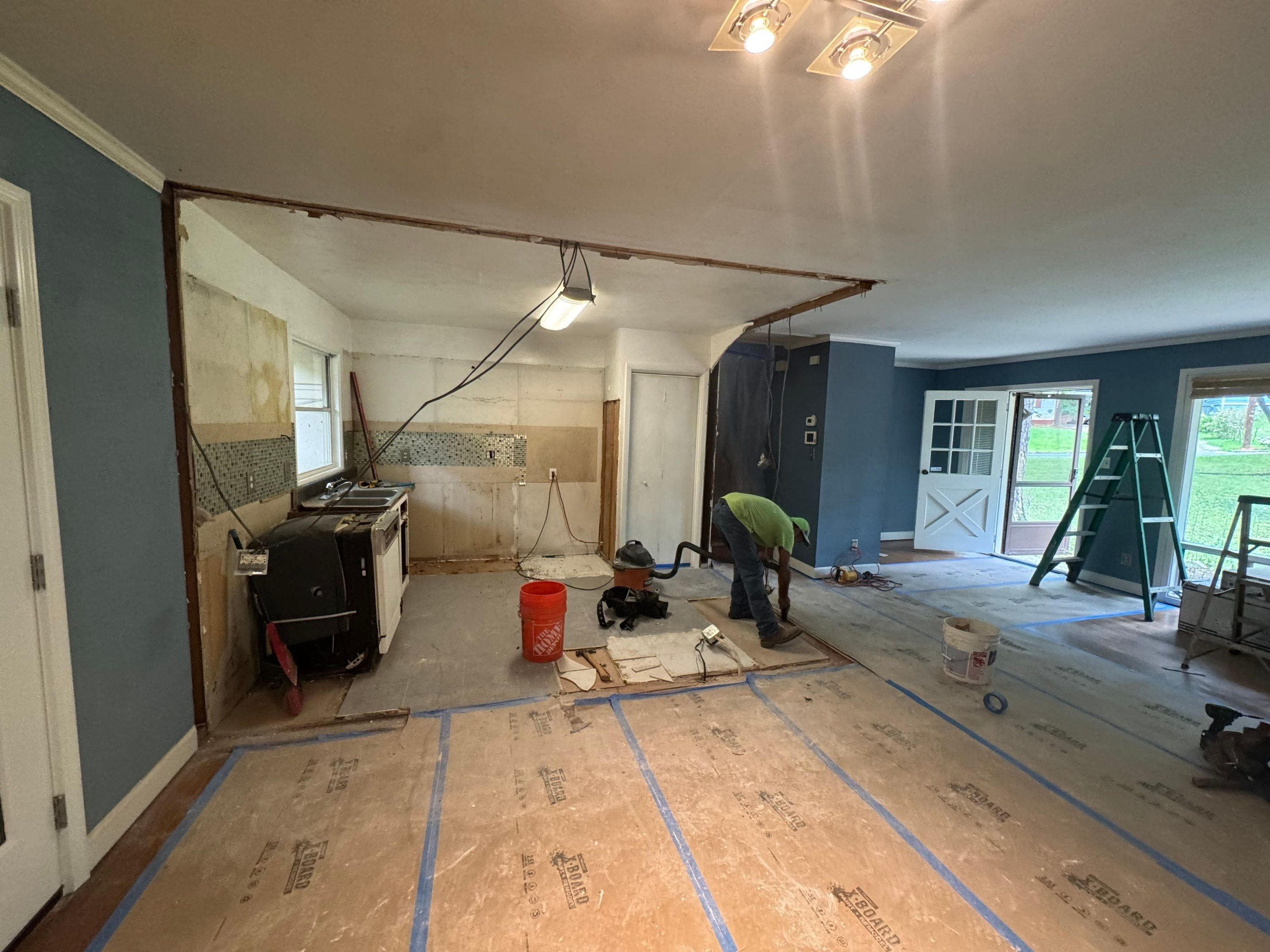 Modern Kitchen Remodeling with Large Central Island in Doraville by Swift Home Renovations
