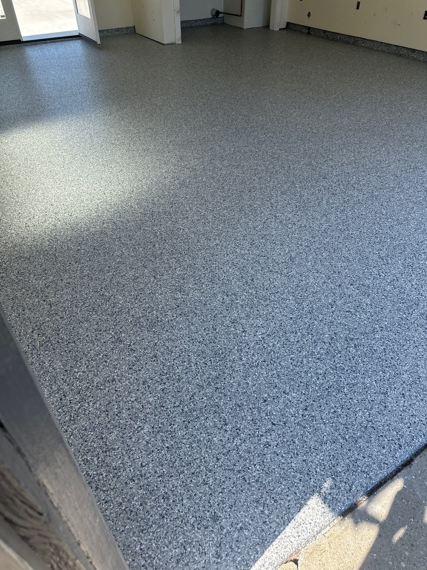 Polyurea Garage Floor Coating with Tidal Wave Flake Finish by MGP Coatings