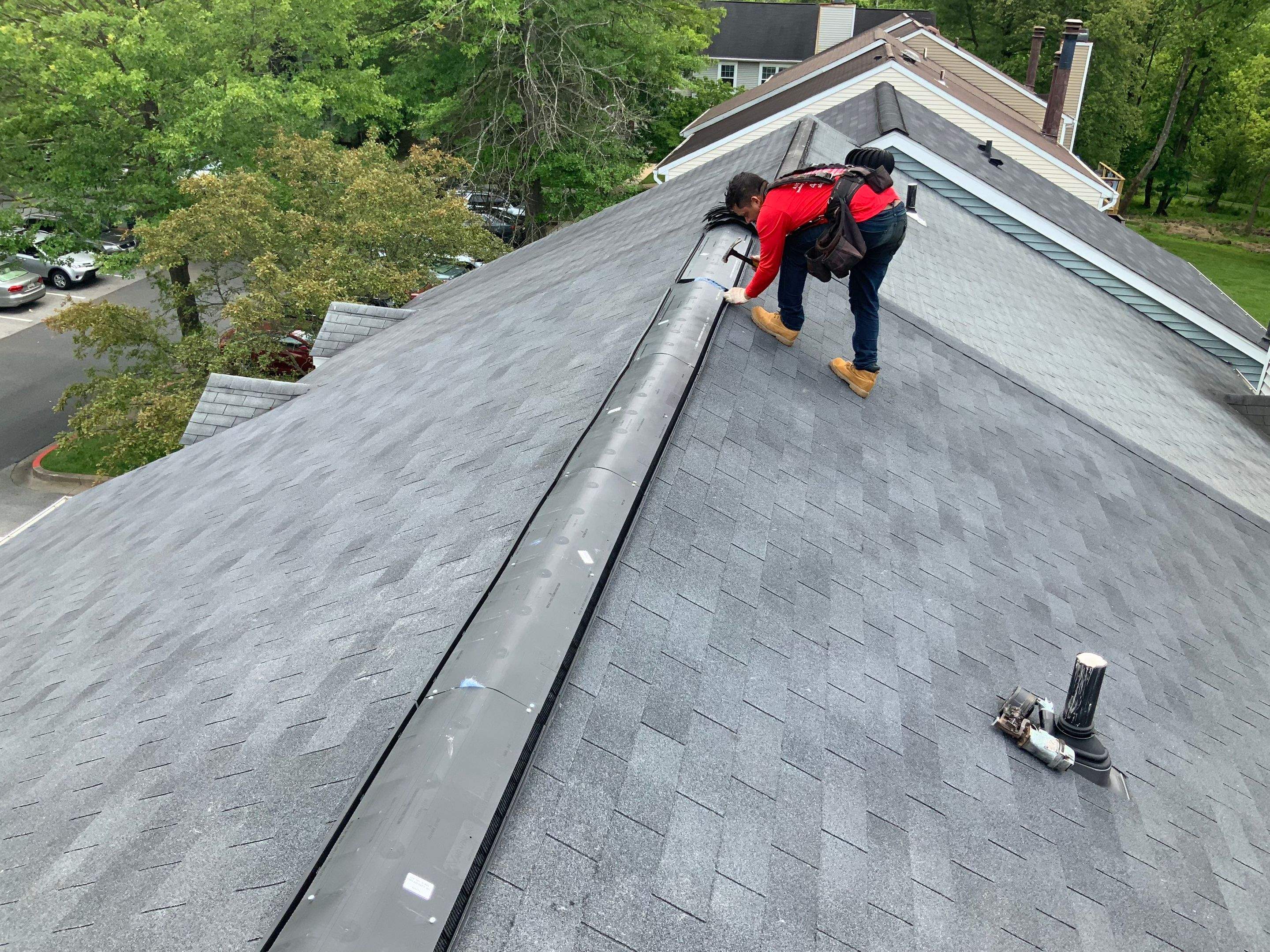 Residential Roofing Installation using XT-25 Color Moire Black by Alpha Design Services