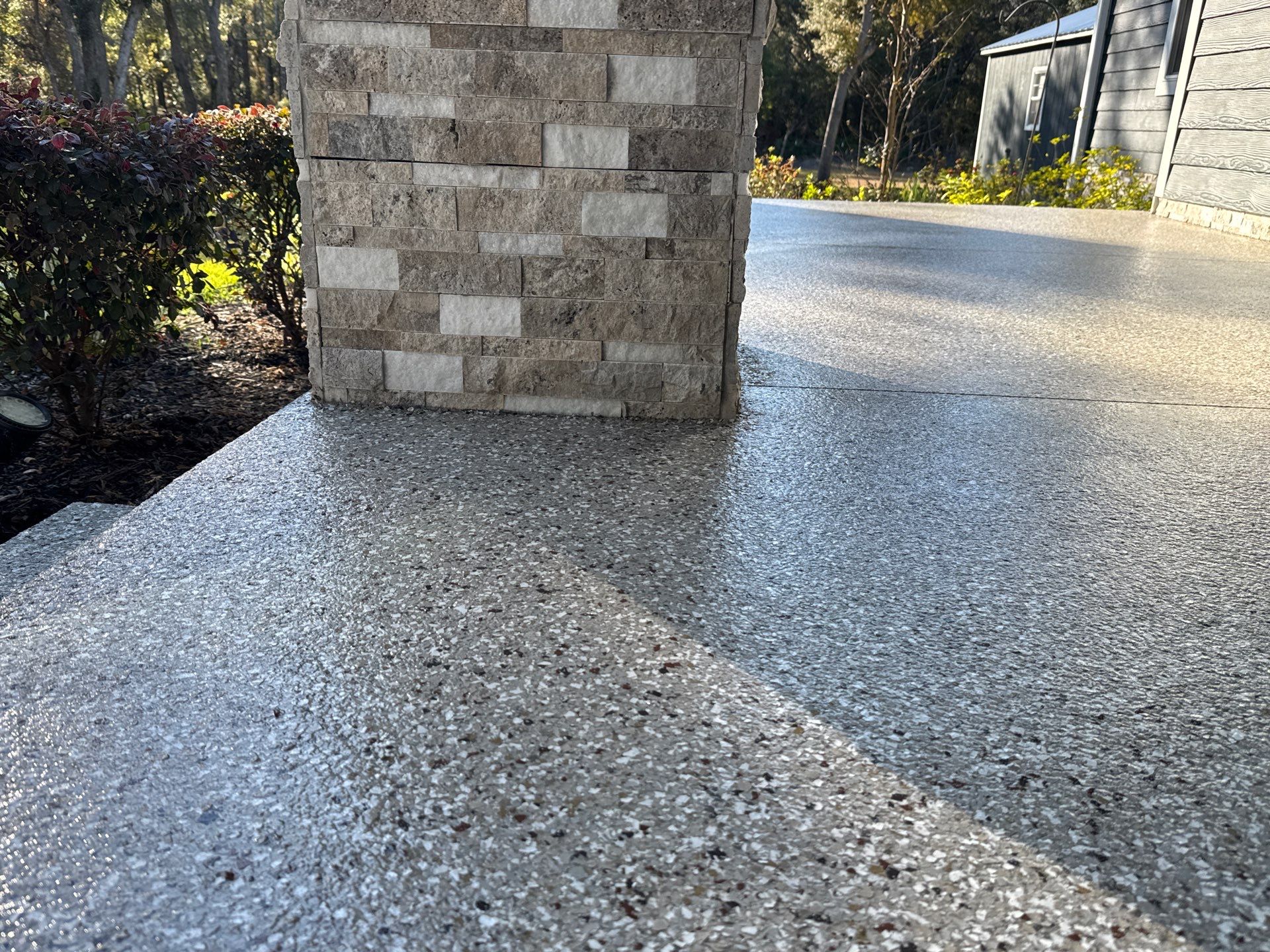 Front and Back Porches in Chiefland, FL in Pebble Beach by Cross Creek Concrete Coatings