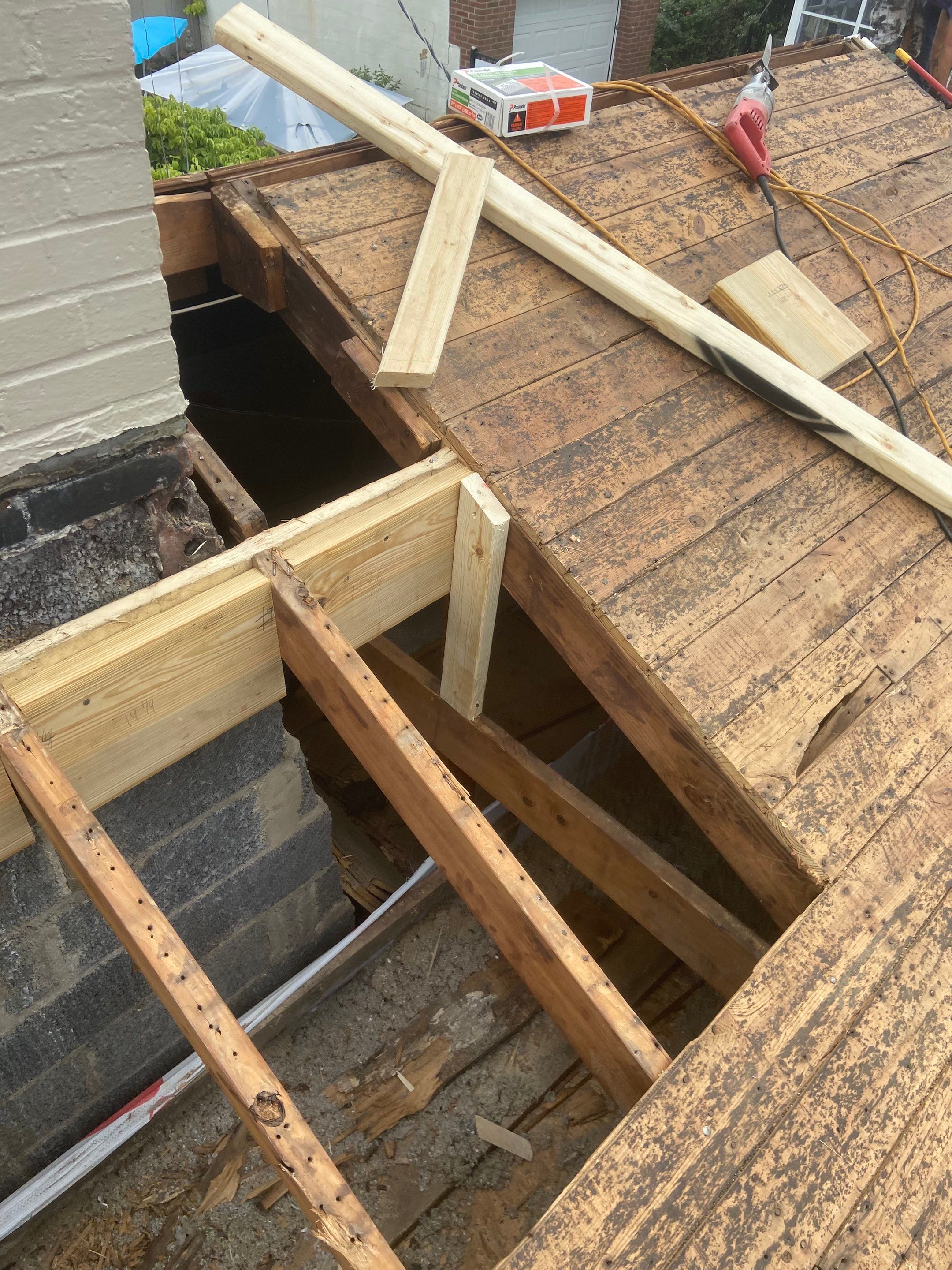 Metal Roofing, Skylights, Porch Build by Secure Construction Company Inc