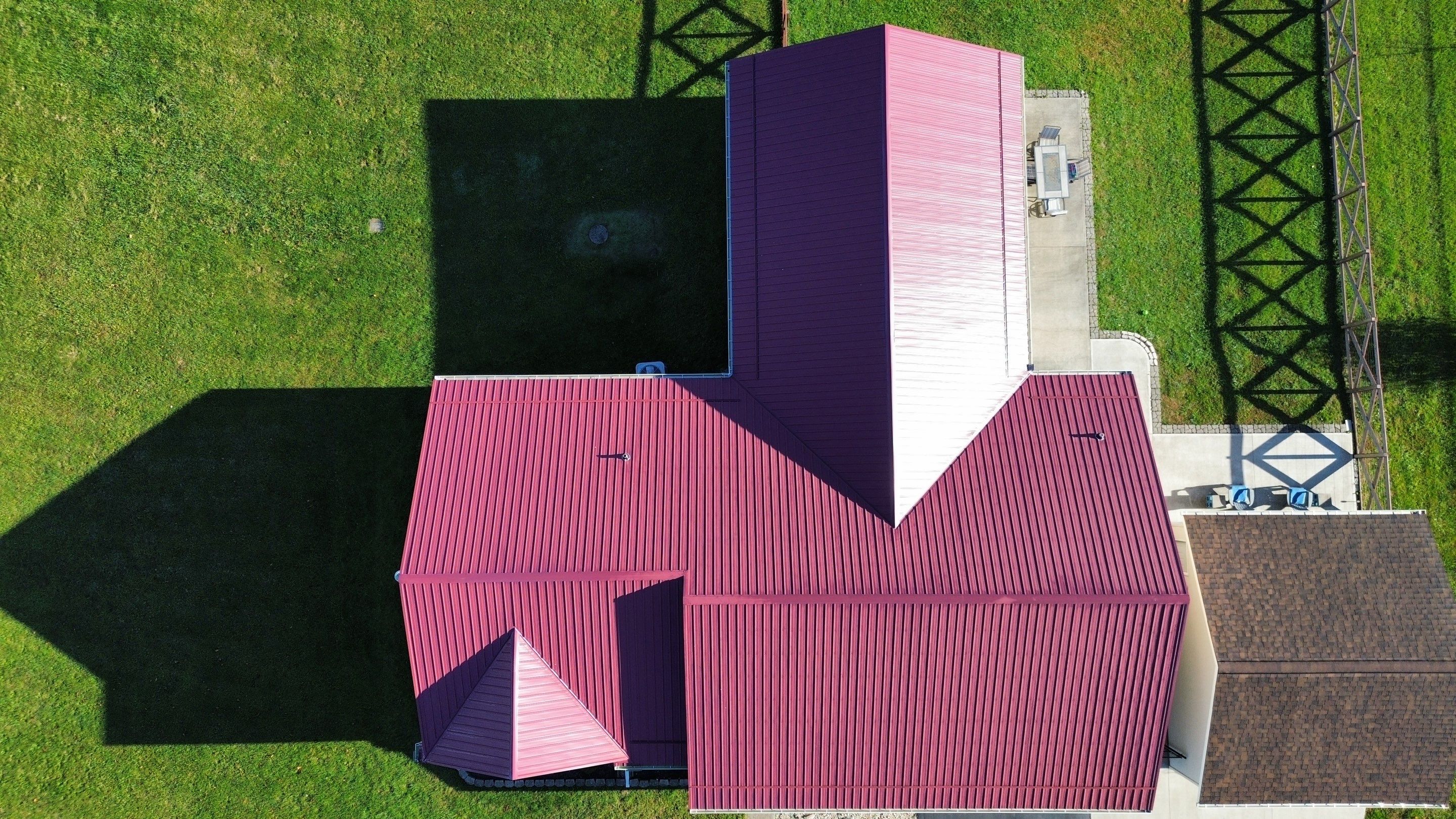 Residential Roofing Installation using Performance Panel Metal - Burgandy by RoofX 