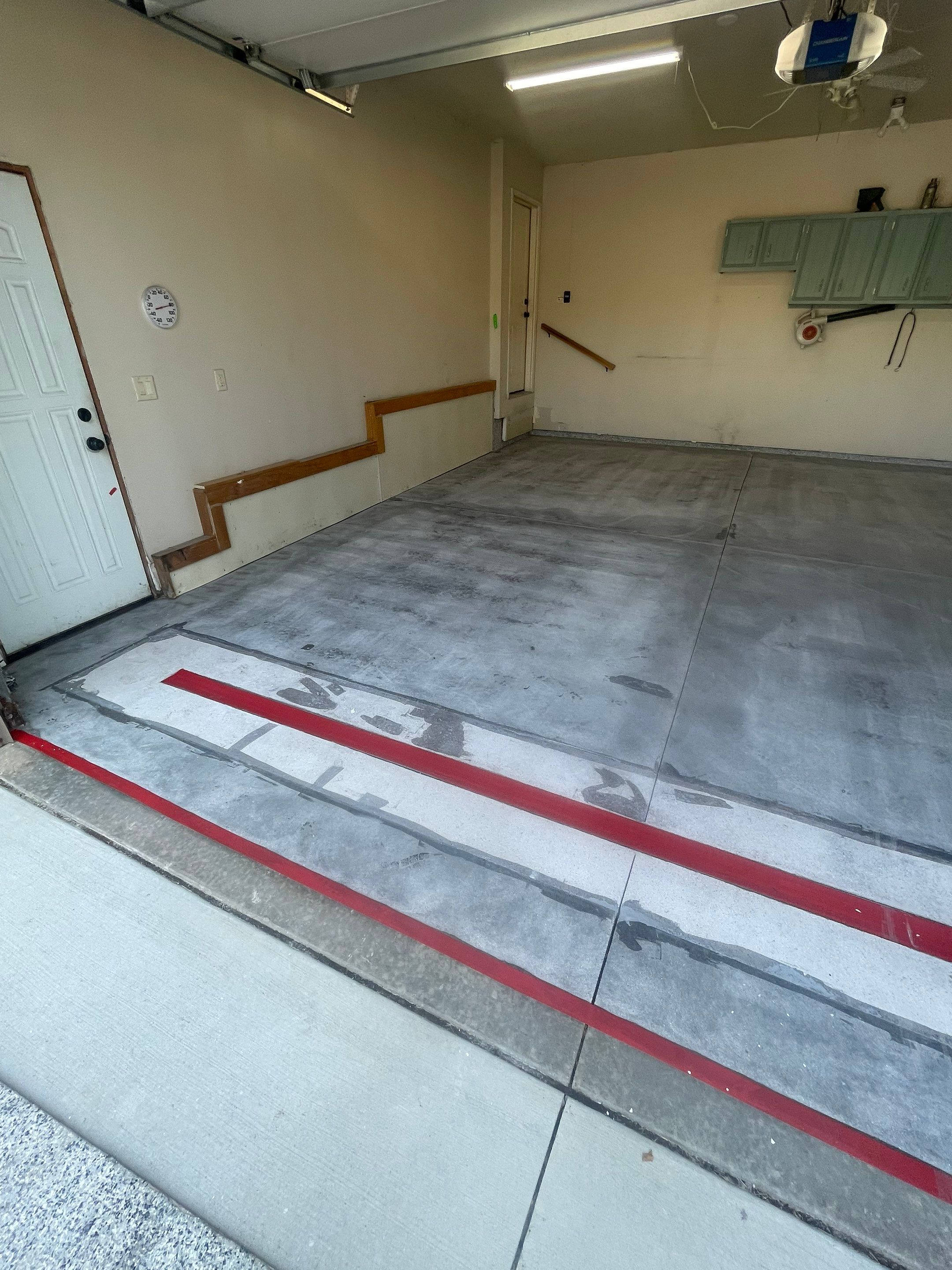 Multi-Stall Garage Floor Coating Installation in Sioux Falls by Select Painting, Coatings & Garage Cabinets