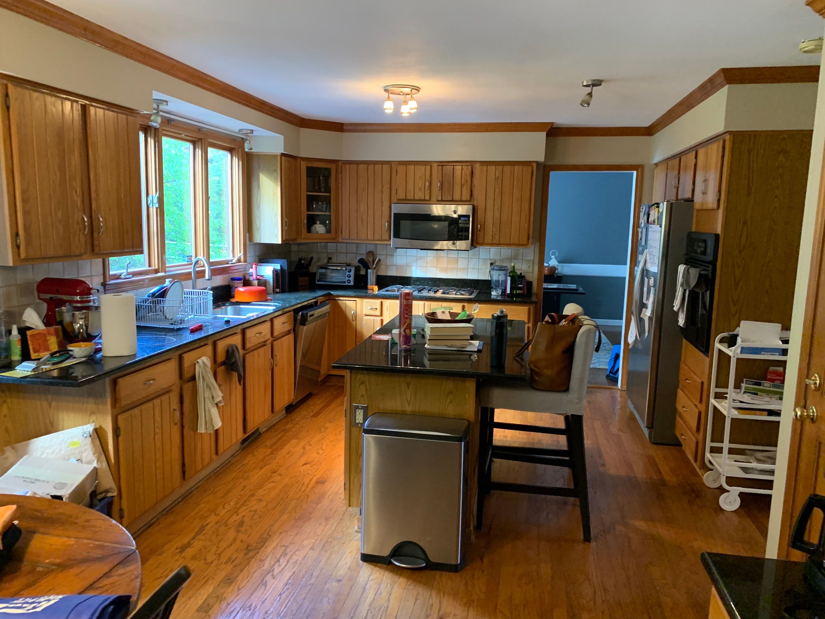 Painting Stained Wood Trim and Staircase. Walls too! by Empire Painting Services, LLC