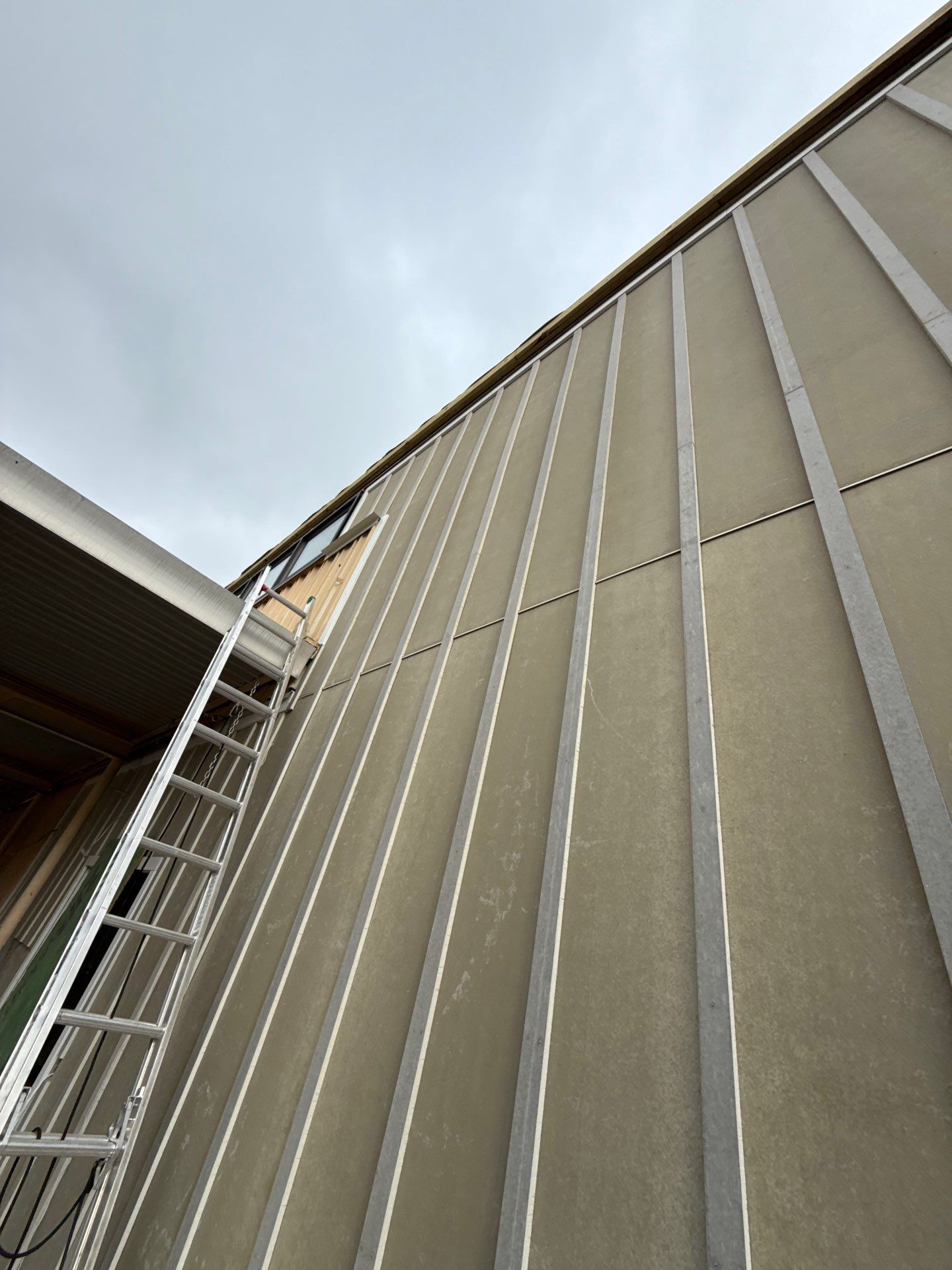 Louisville Commercial Building Siding and Window Installation by GreenForce Restoration