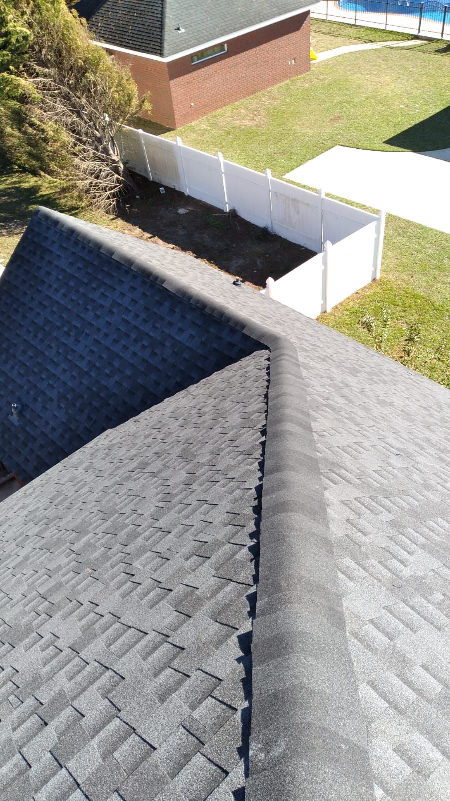 Residential Roofing Installation using Roof Replacement by American Roofing & Construction LLC