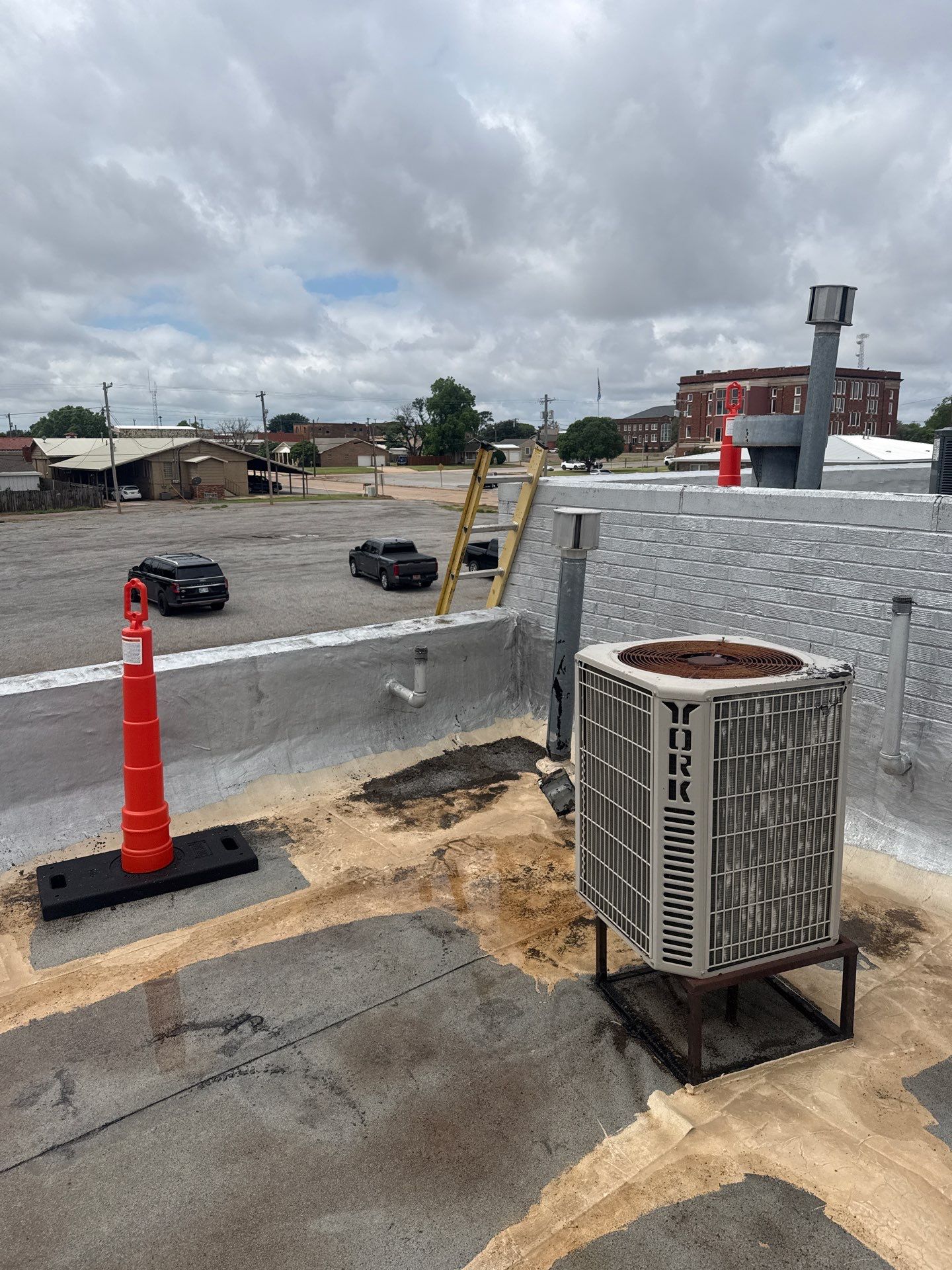Hollis High School Comprehensive TPO Roof Replacement and Restoration by Secondary Rhodes